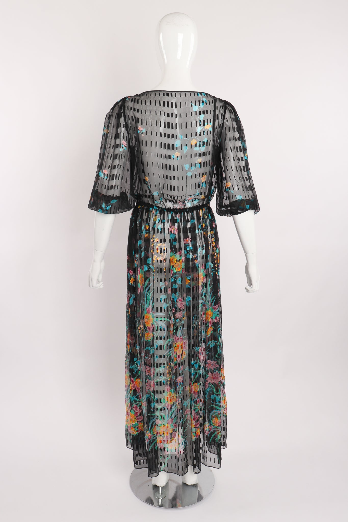 Vintage Sheer Floral Puff Sleeve Dress on Mannequin back at Recess Los Angeles