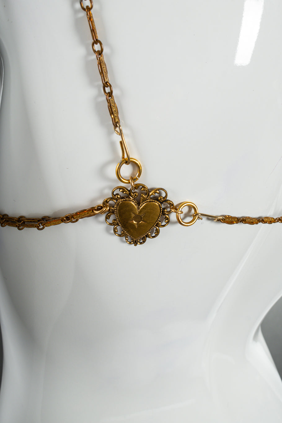 Filigree bra chain harness mannequin heart charm close @recessla