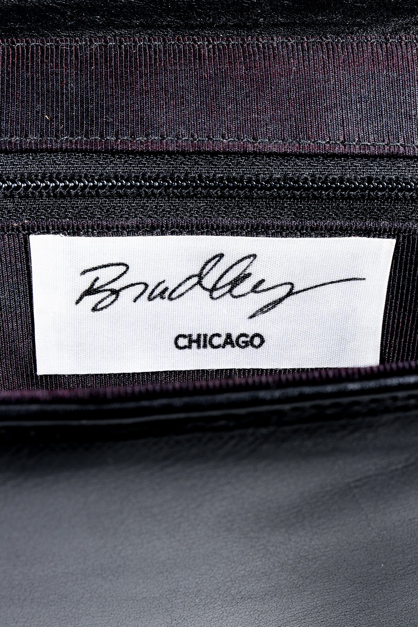 Vintage Bradley Emerald Eyes Beaded Bag Label on black