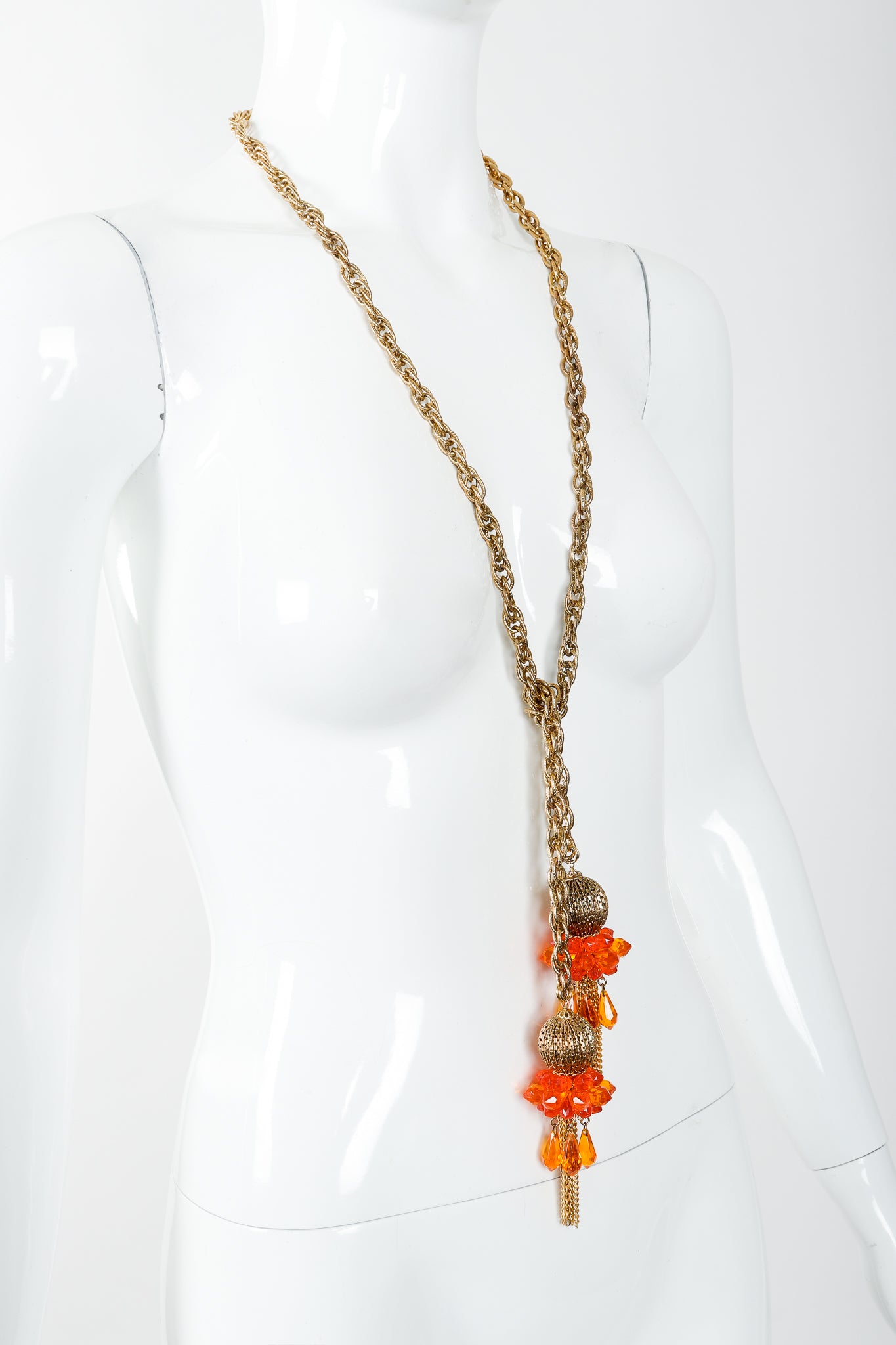 Vintage Unsigned Fiery Orange Beaded Tassel Wrap Necklace on Mannequin, wrapped at Recess