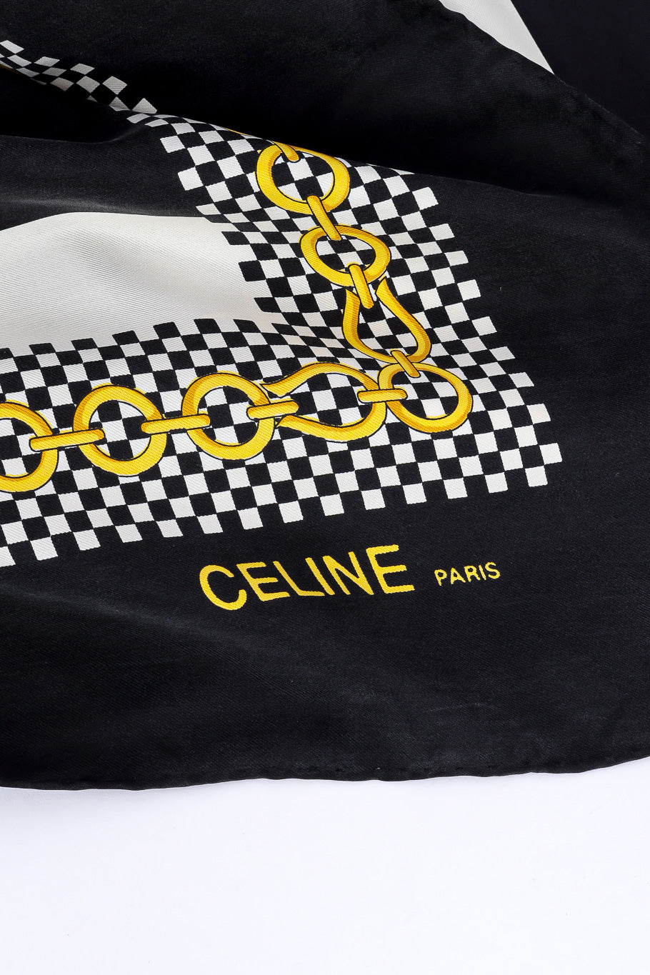 Equestrian chain graphic scarf by Celine photo of graphic details of designer logo. @recessla