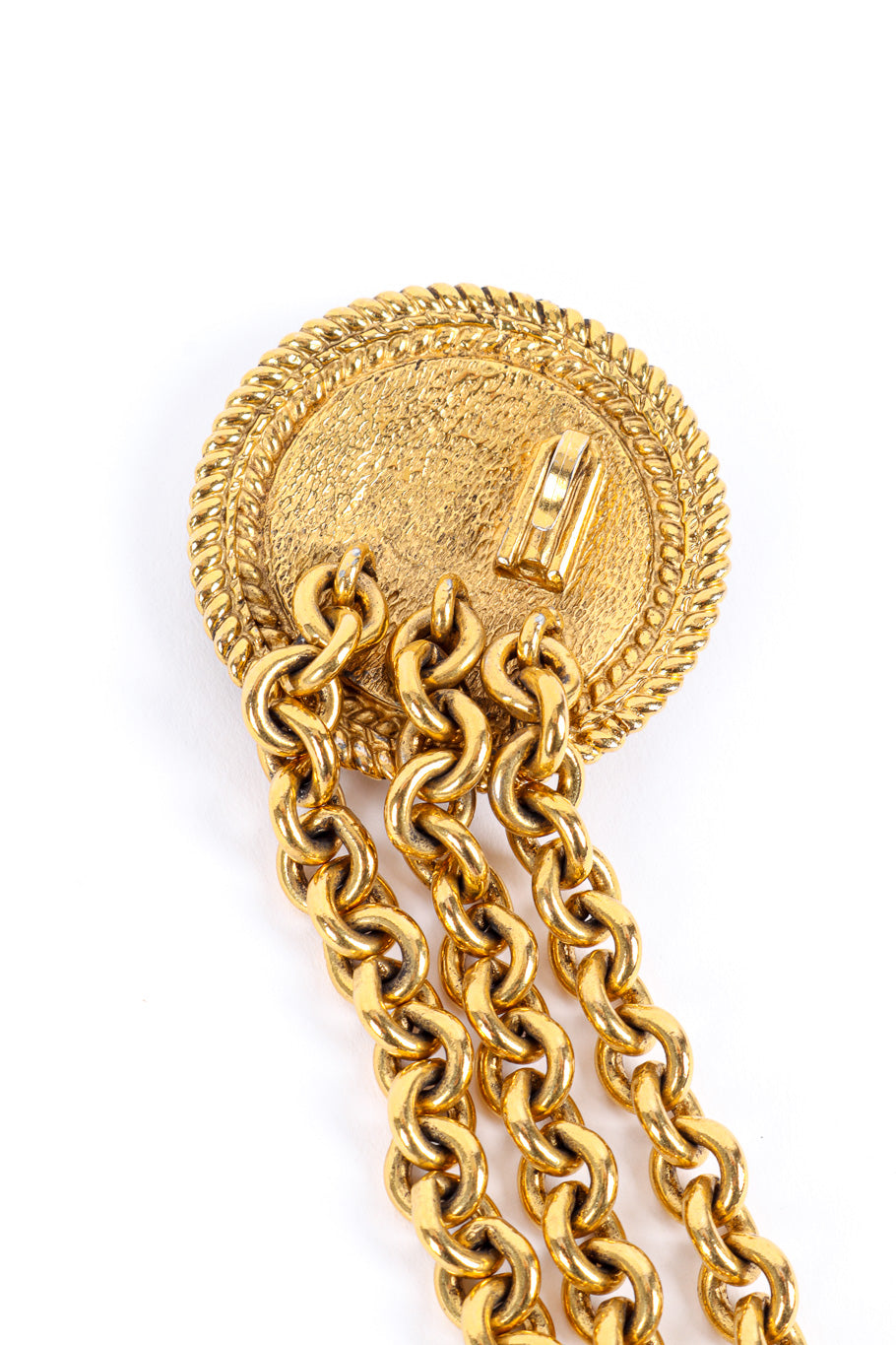 Medallion chain drop belt by Chanel flat lay inside medallion hook @recessla