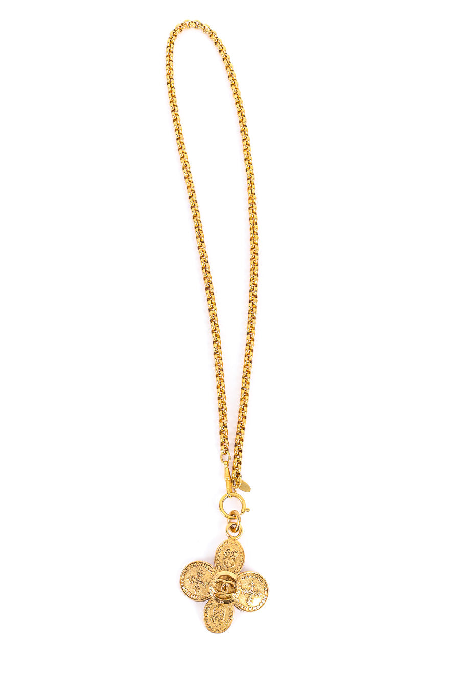 Clover Crest Cross Pendant Necklace by Chanel flat lay @recessla