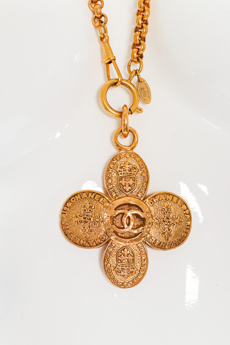 Clover Crest Cross Pendant Necklace by Chanel mannequin front @recessla