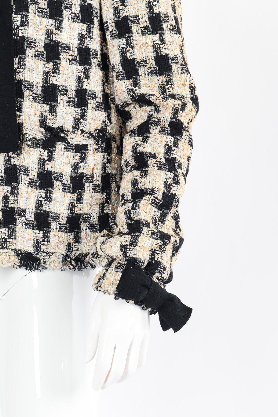 Bouclé check jacket by Chanel mannequin sleeve @recessla