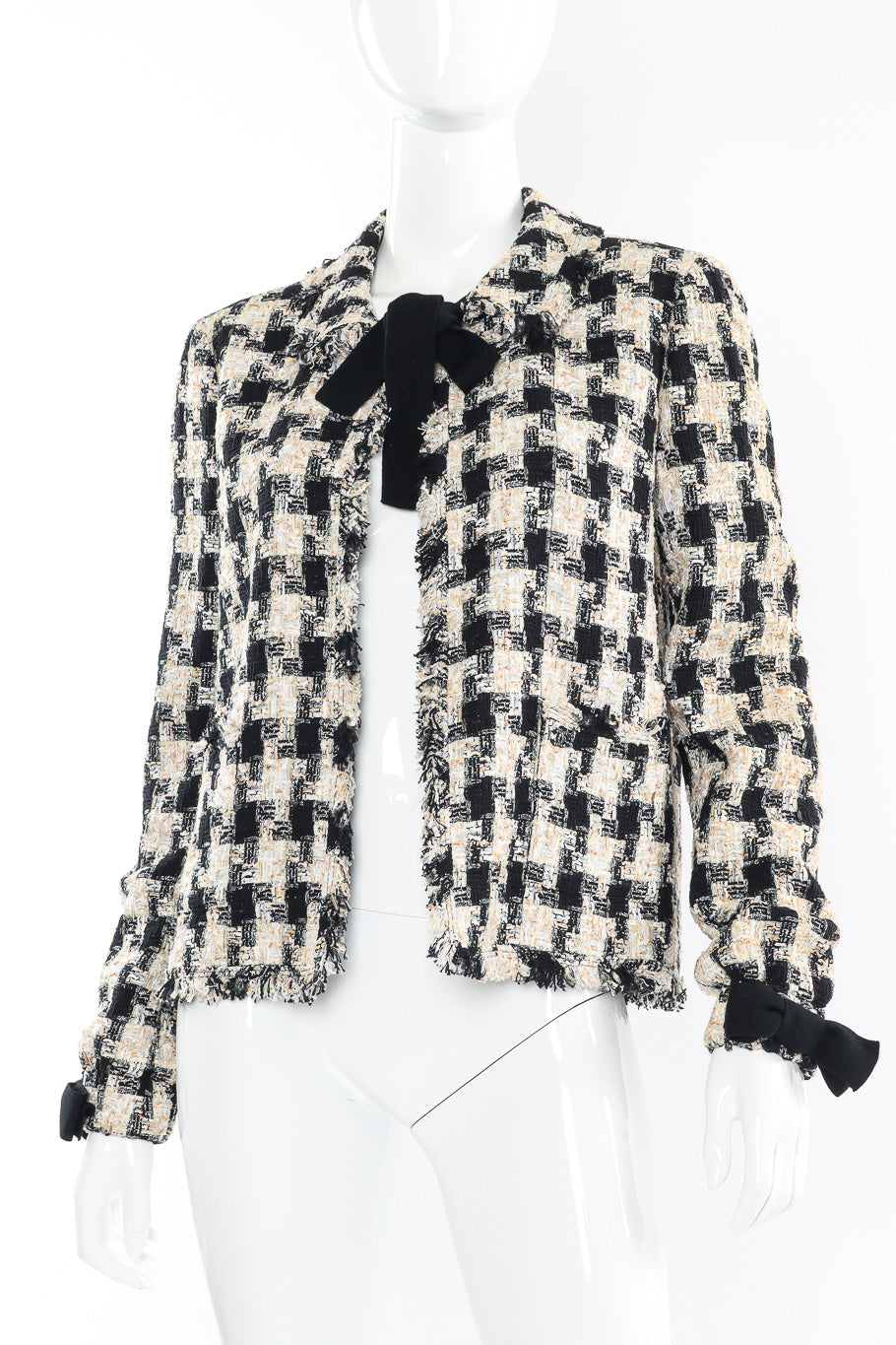 Bouclé check jacket by Chanel mannequin front tied close @recessla