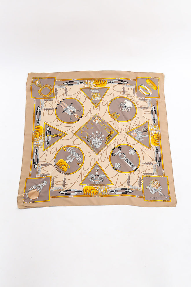 Jeweled accessory motif scarf by Cartier Flat Lay Photo. @recessla