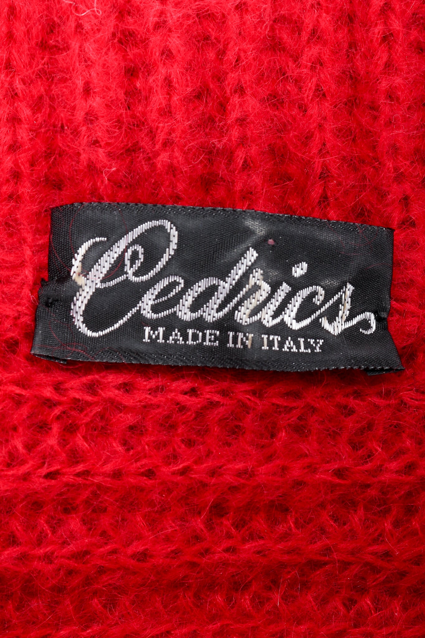 Recess Vintage Cedrics label on red knit sweater