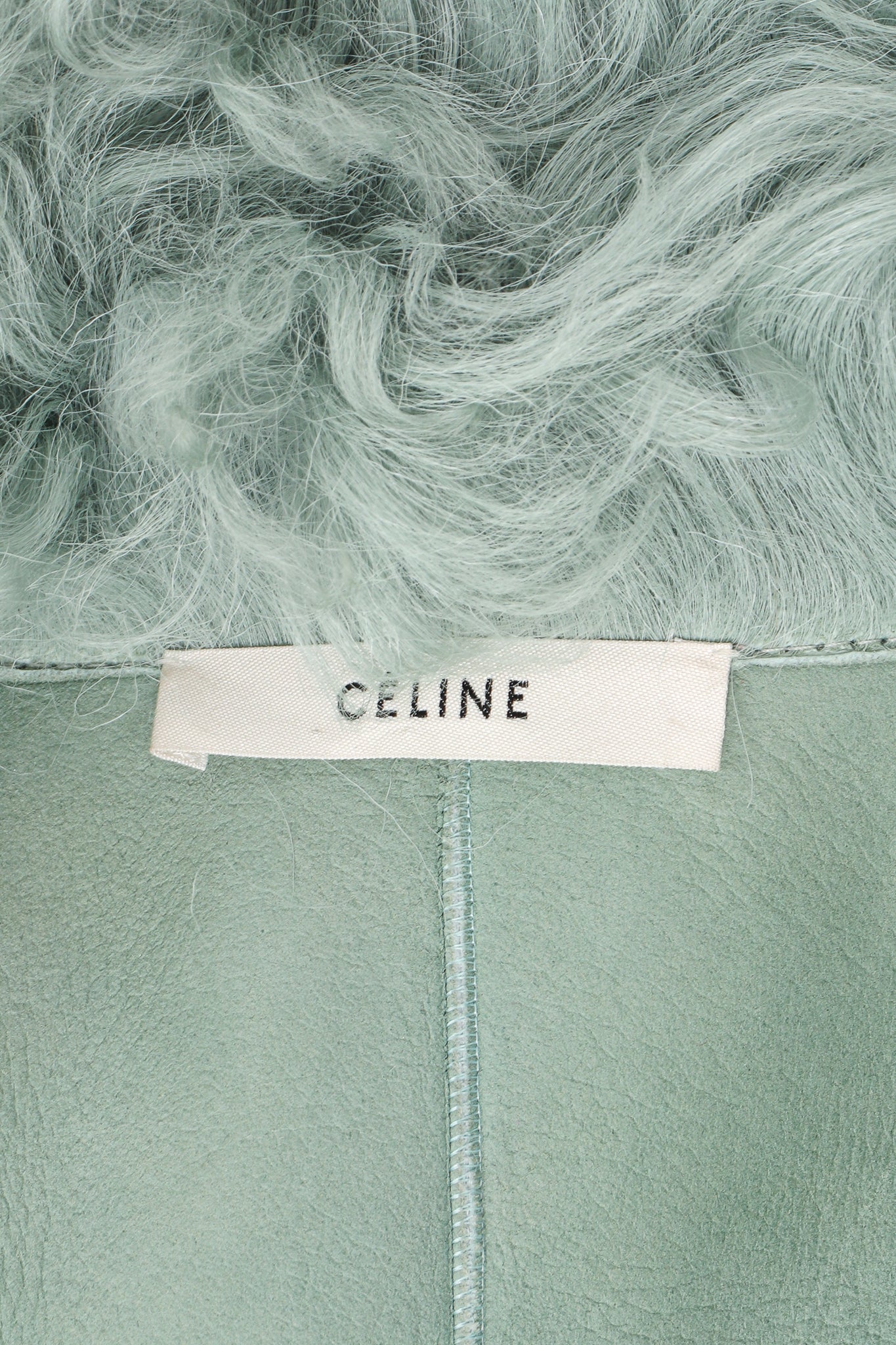 Vintage Celine Seafoam Curly Lamb Fur Coat label at Recess Los Angeles