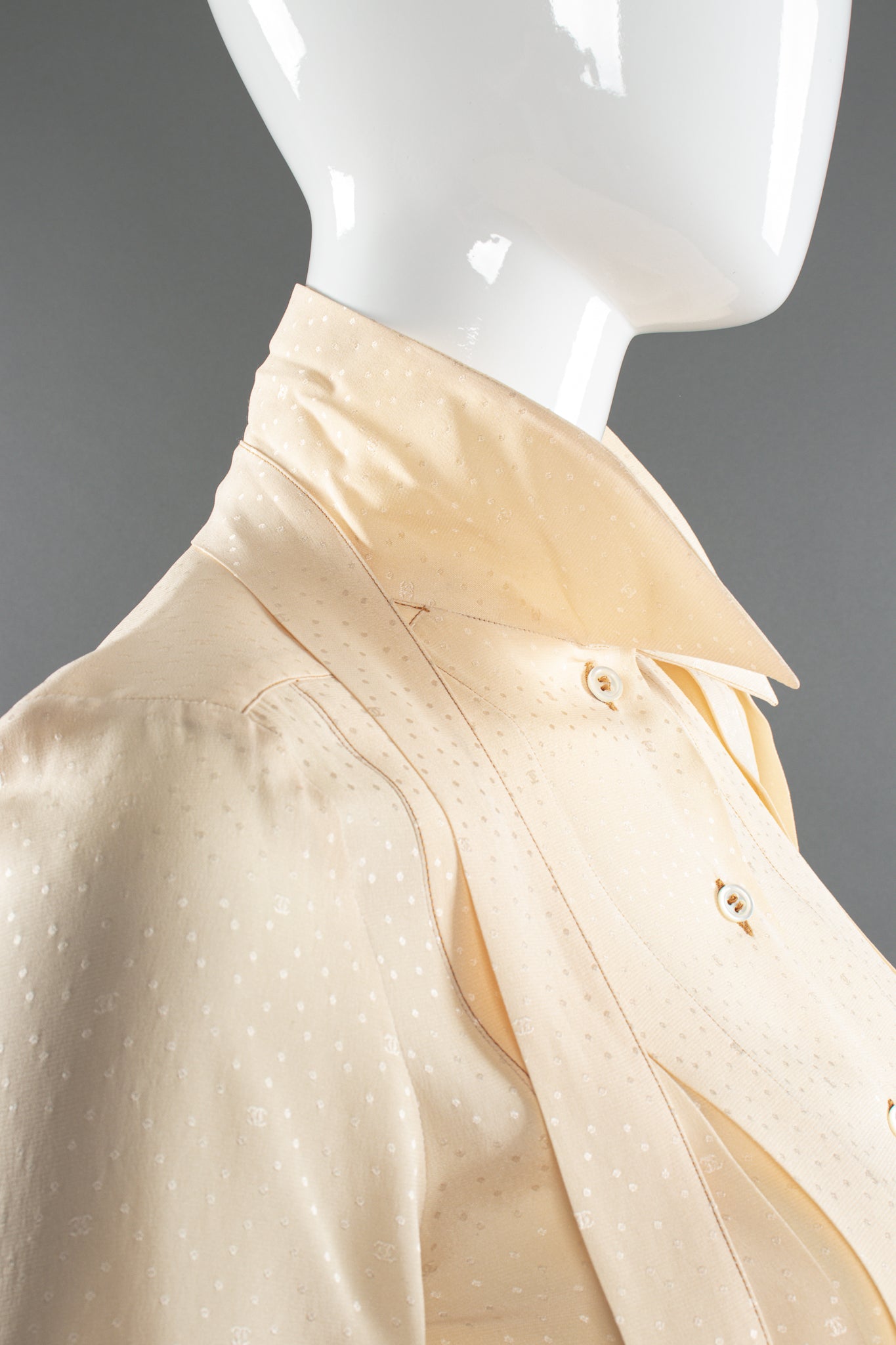 Vintage Chanel Jacquard Dot Logo Bow Blouse on Mannequin collar at Recess Los Angeles