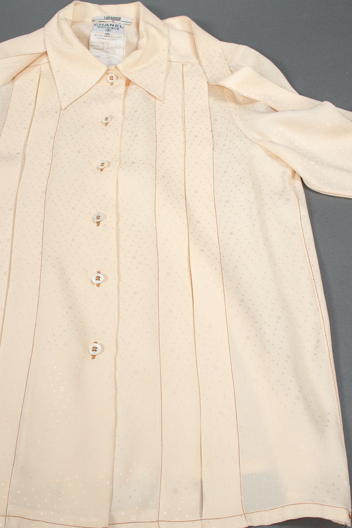Vintage Chanel Jacquard Dot Logo Bow Blouse placket inverted pleat at Recess Los Angeles
