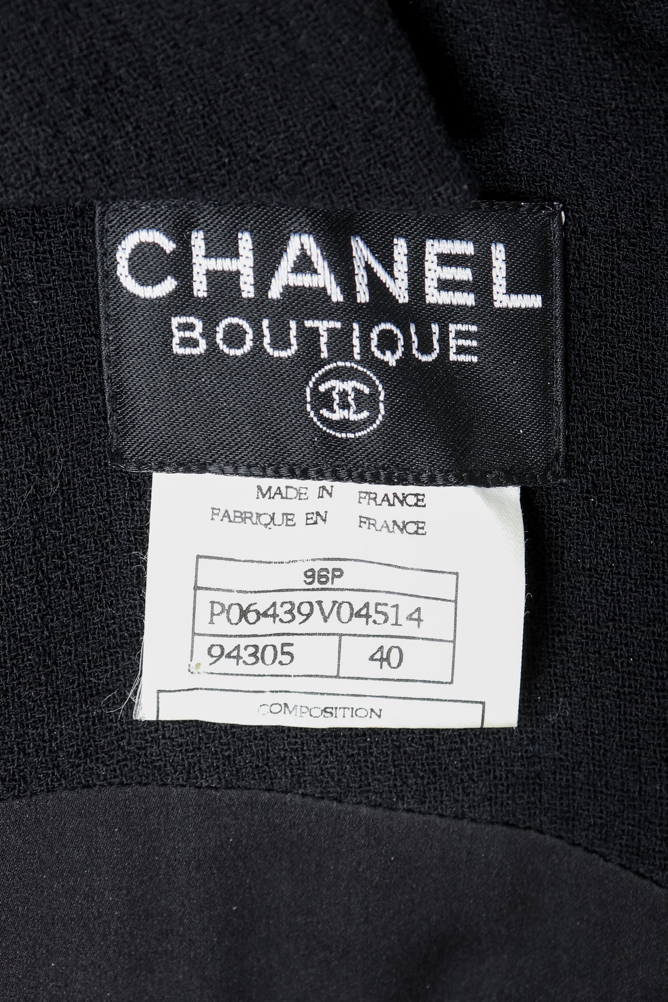 Vintage Chanel Label on black Fabric