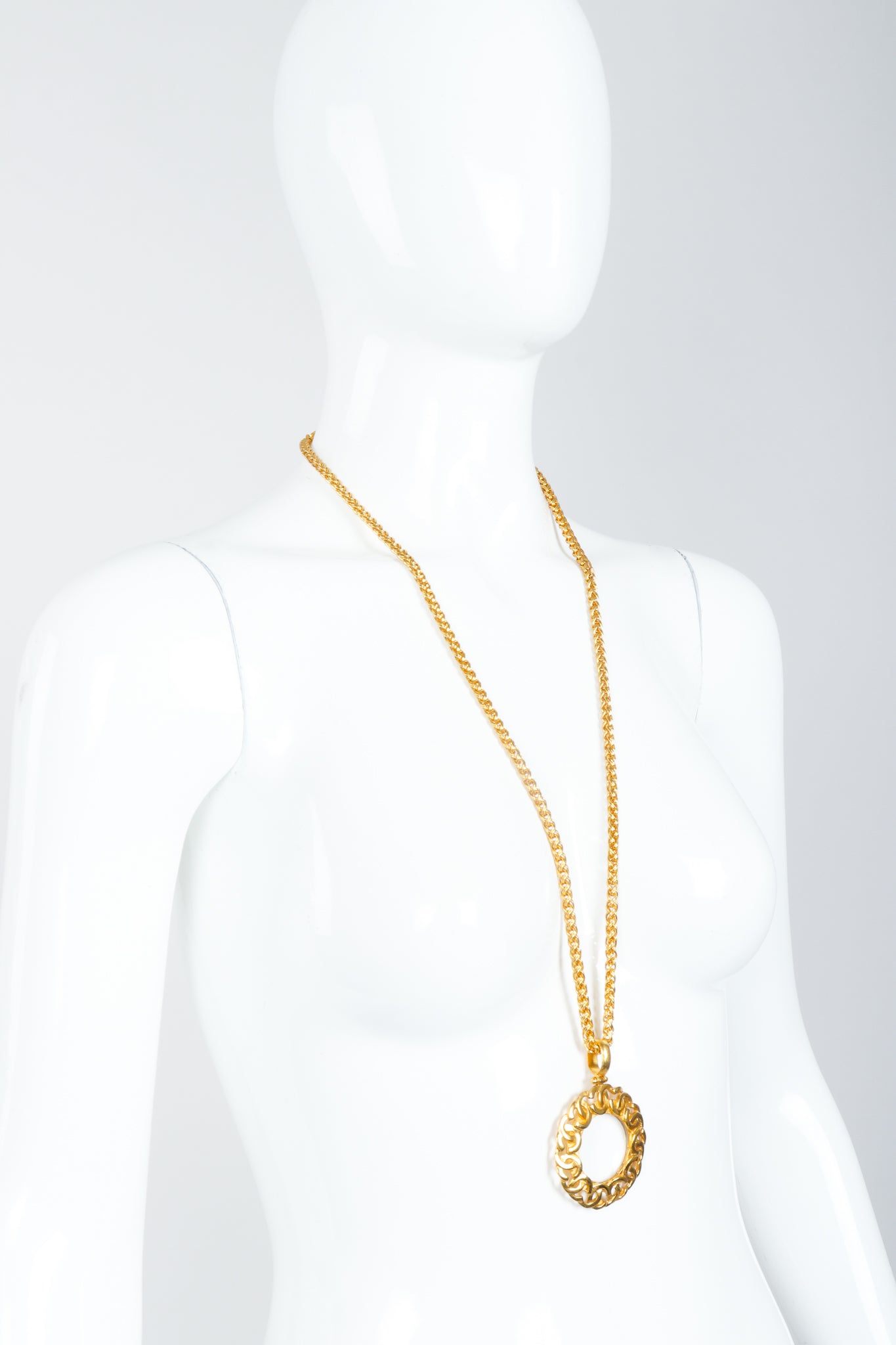 Vintage Chanel Gold CC Logo Magnifying Glass Pendant Necklace on Mannequin