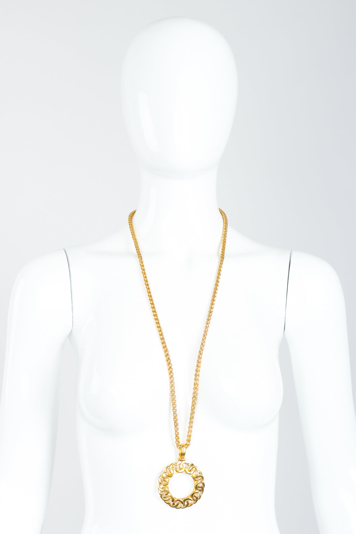 Vintage Chanel Gold CC Logo Magnifying Glass Pendant Necklace on Mannequin
