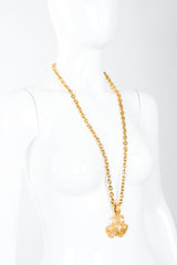 Vintage Chanel Gold Long Triple CC Logo Pendant Necklace swirled on mannequin