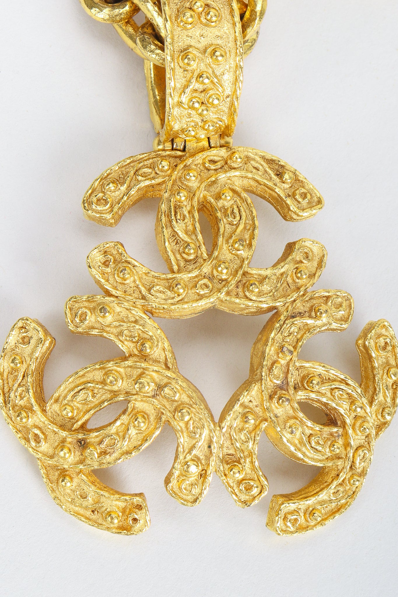 Vintage Chanel Gold Long Triple CC Logo Pendant Necklace swirled on grey