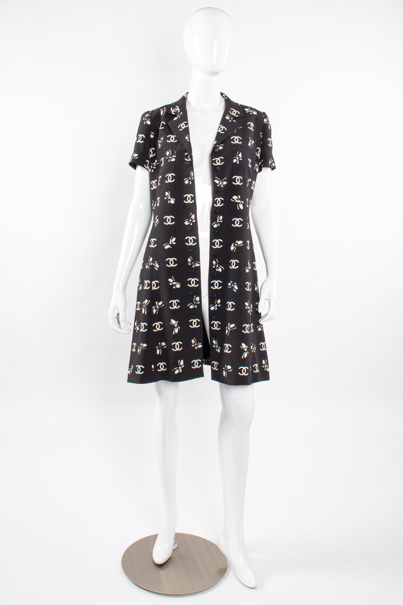 Vintage Chanel 1997 Cruise Bow Butterfly CC Logo Print Dress on mannequin open @ Recess LA