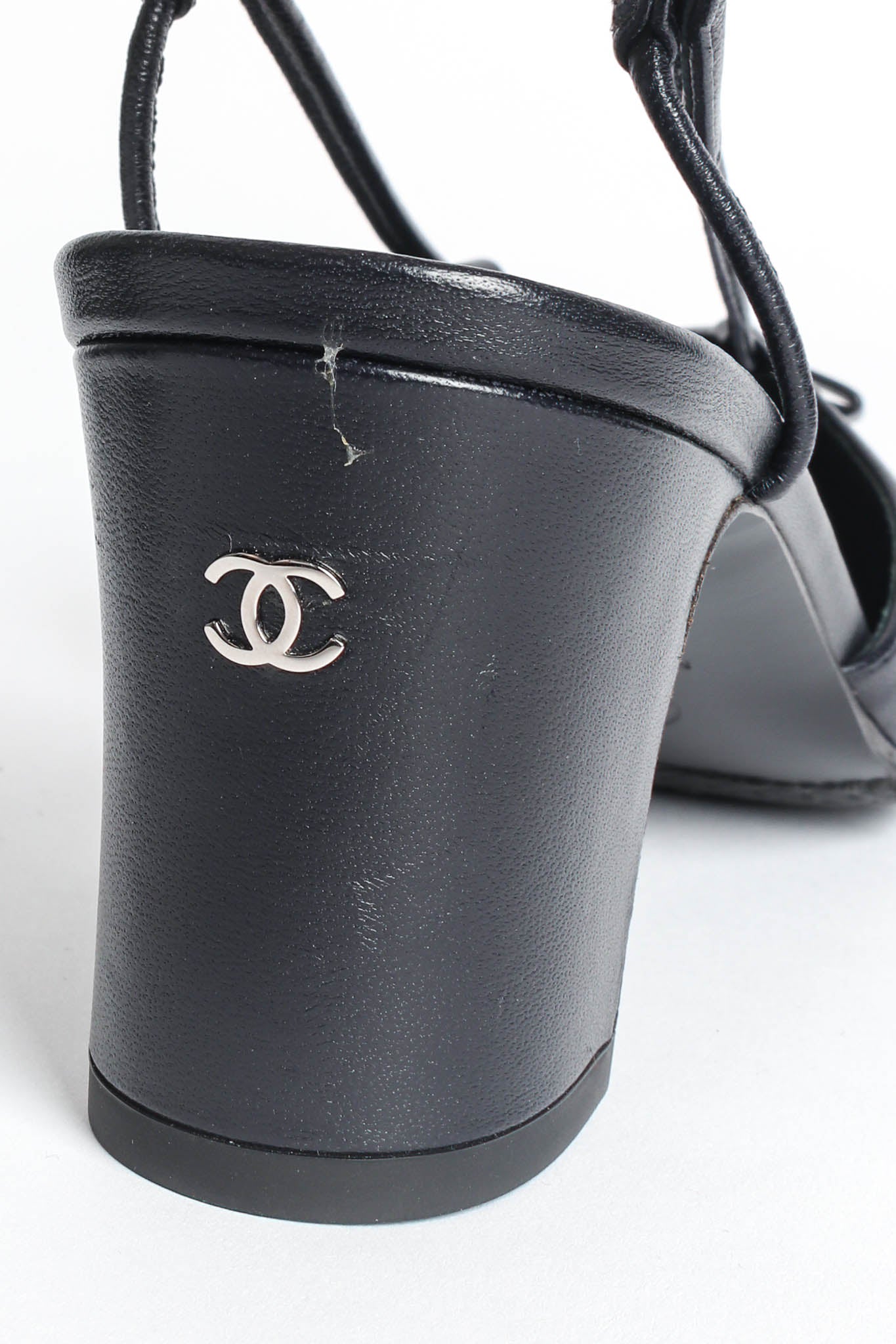 Vintage Chanel Cap Toe Bow Slingback Heels dried glue mark on right heel @ Recess Los Angeles