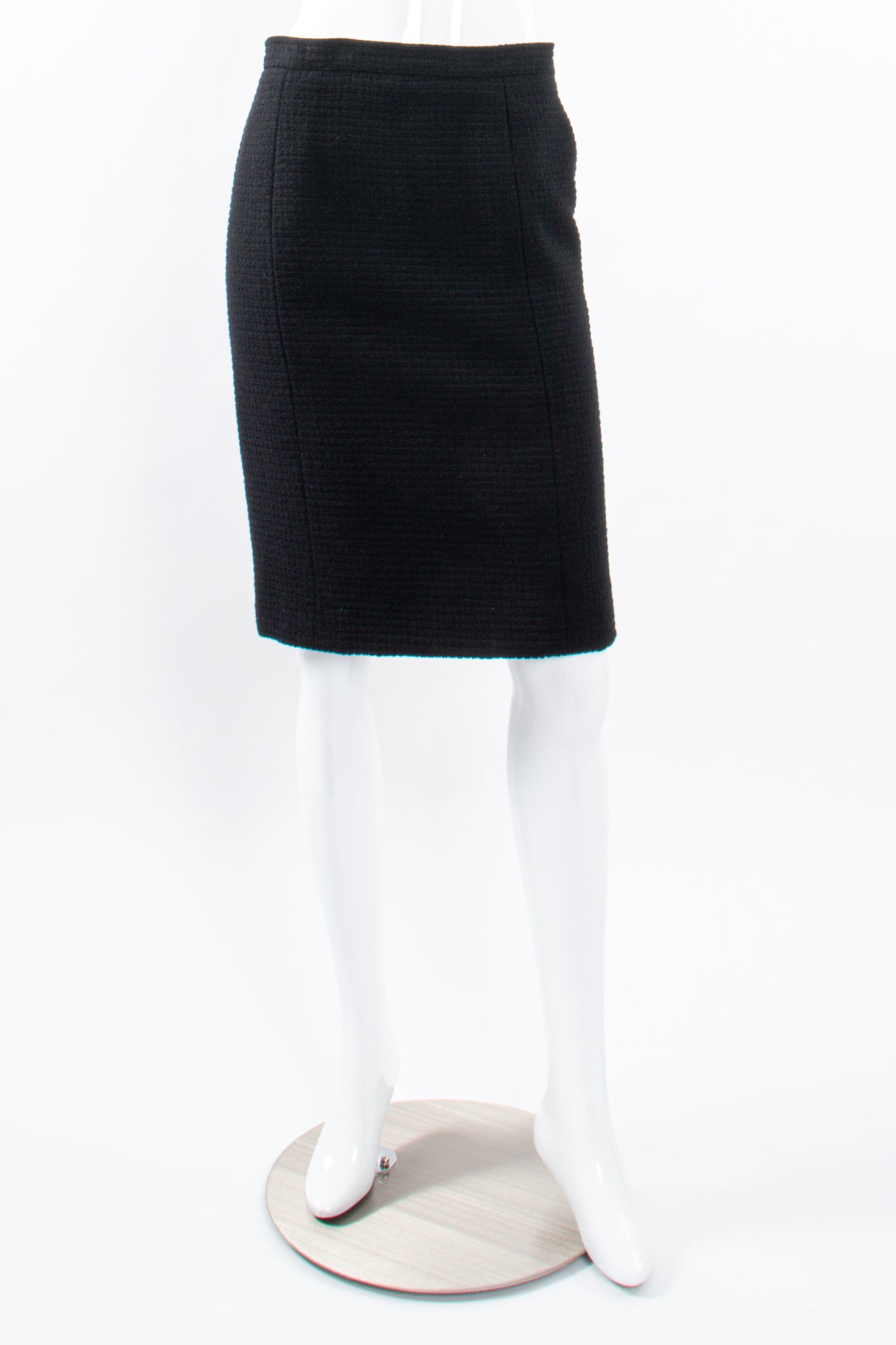 Vintage Chanel Monochrome Tweed Boxy Jacket and Skirt Set skirt front on Mannequin at Recess LA