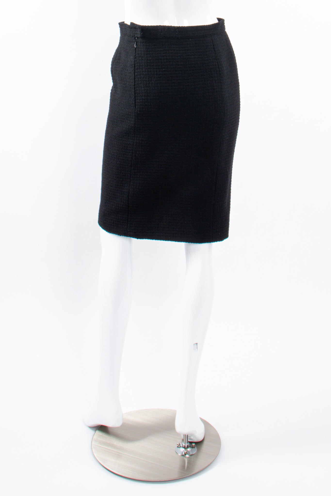 Vintage Chanel Monochrome Tweed Boxy Jacket and Skirt Set skirt back on Mannequin at Recess LA