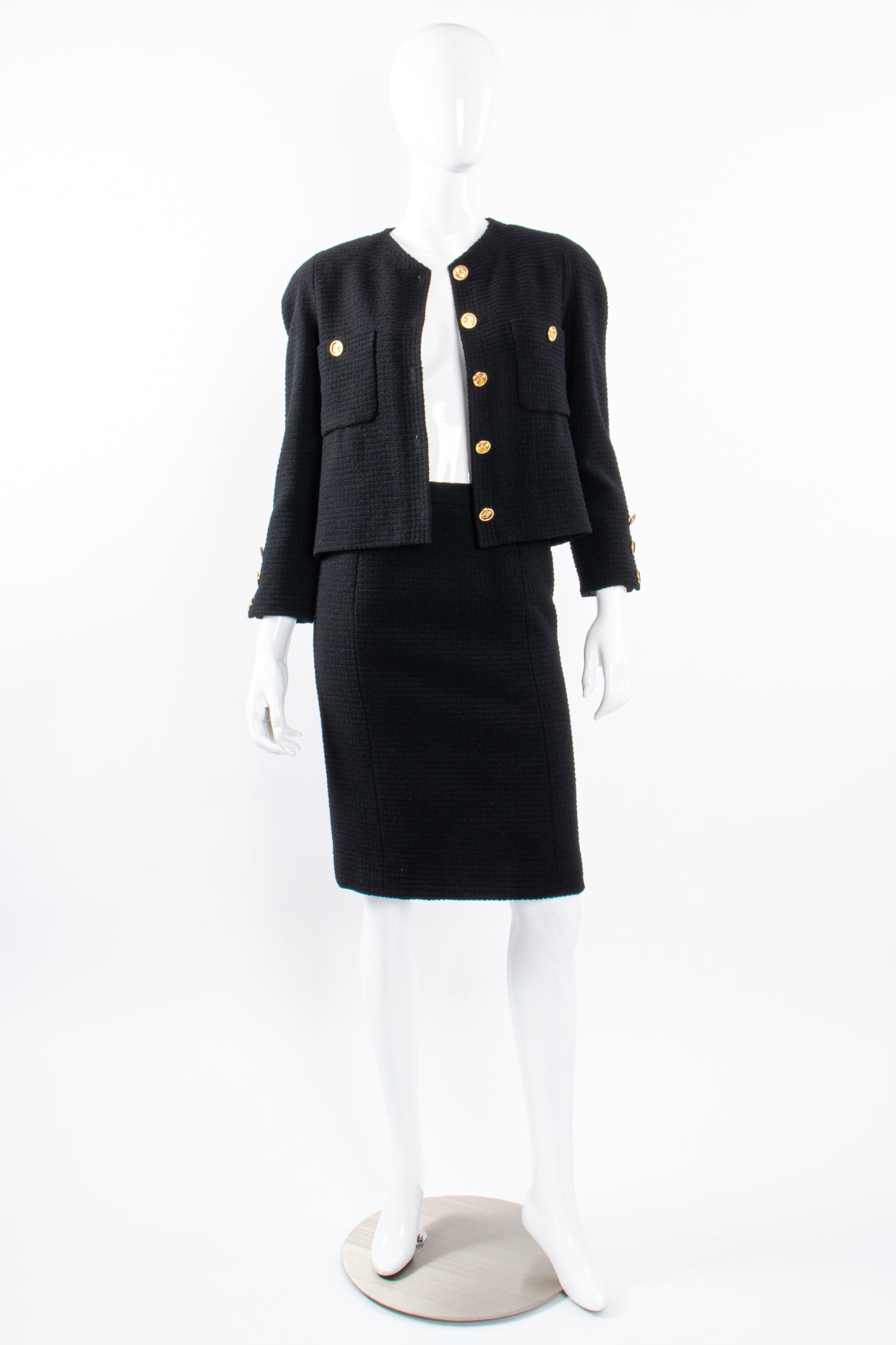 Vintage Chanel Classic Monochrome Tweed Boxy Jacket and Skirt Set open on Mannequin at Recess LA