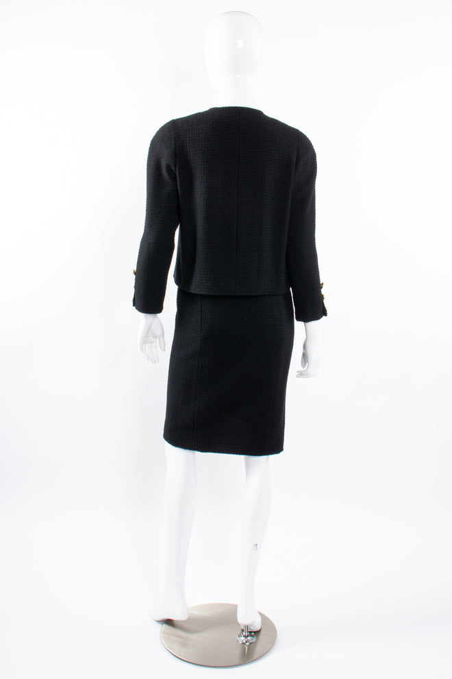 Vintage Chanel Classic Monochrome Tweed Boxy Jacket and Skirt Set back on Mannequin at Recess LA