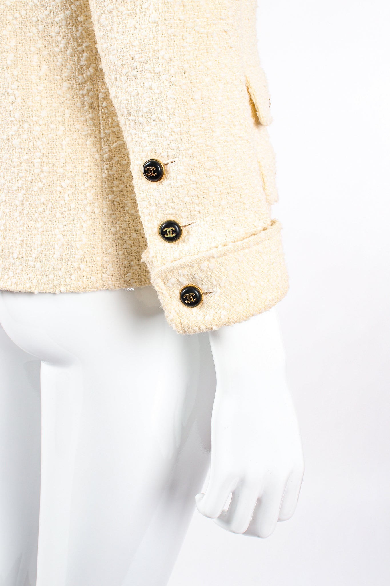 Vintage Chanel 1995 Bouclé Tweed Double Pocket Jacket on Mannequin cuff at Recess Los Angeles