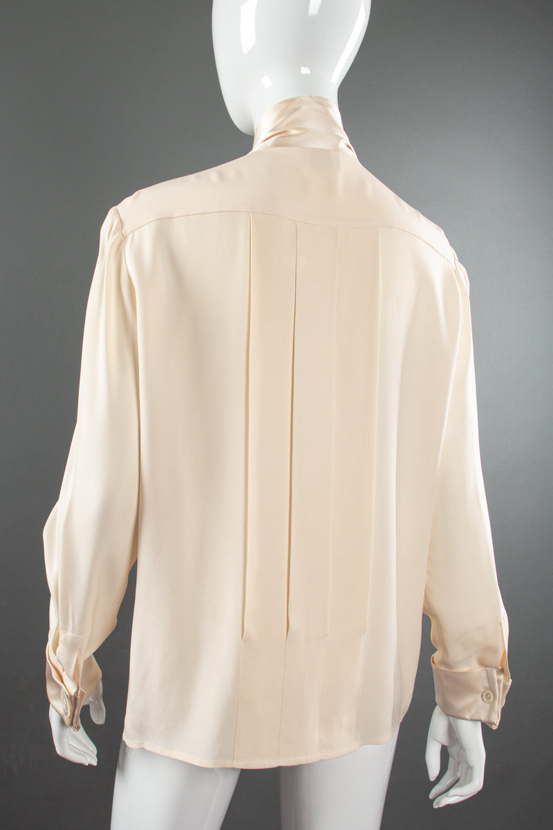 Vintage Chanel Cream Silk Panel Tuck Bow Blouse on Mannequin back at Recess Los Angeles