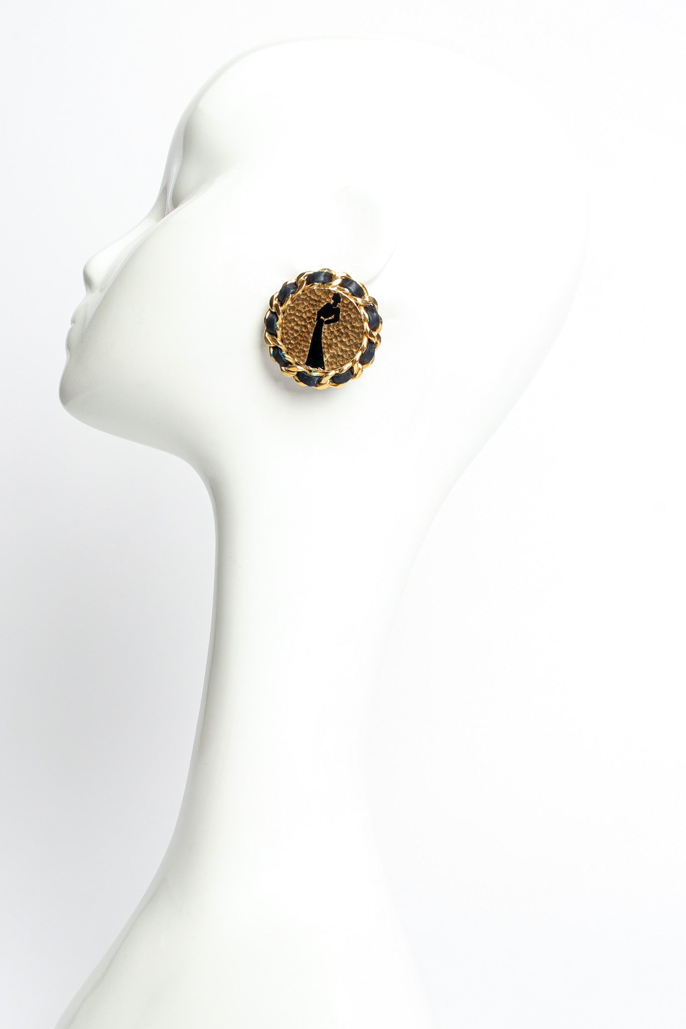 Vintage Chanel 1987 Mademoiselle Silhouette Leather Earrings on mannequin @ Recess LA