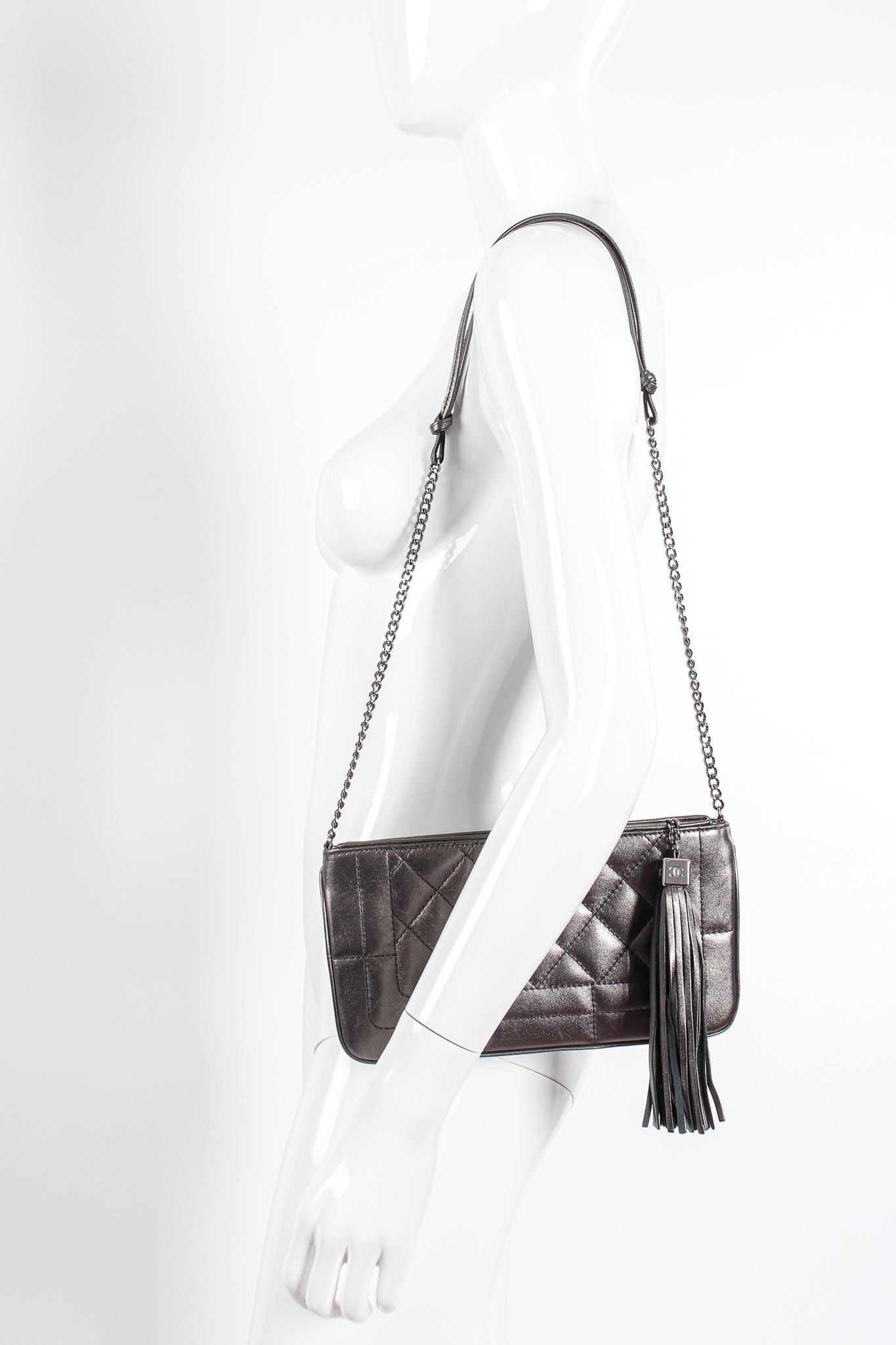 Vintage Chanel 2004 Metallic Quilted Tassel Shoulder Bag on Mannequin at Recess Los Angeles