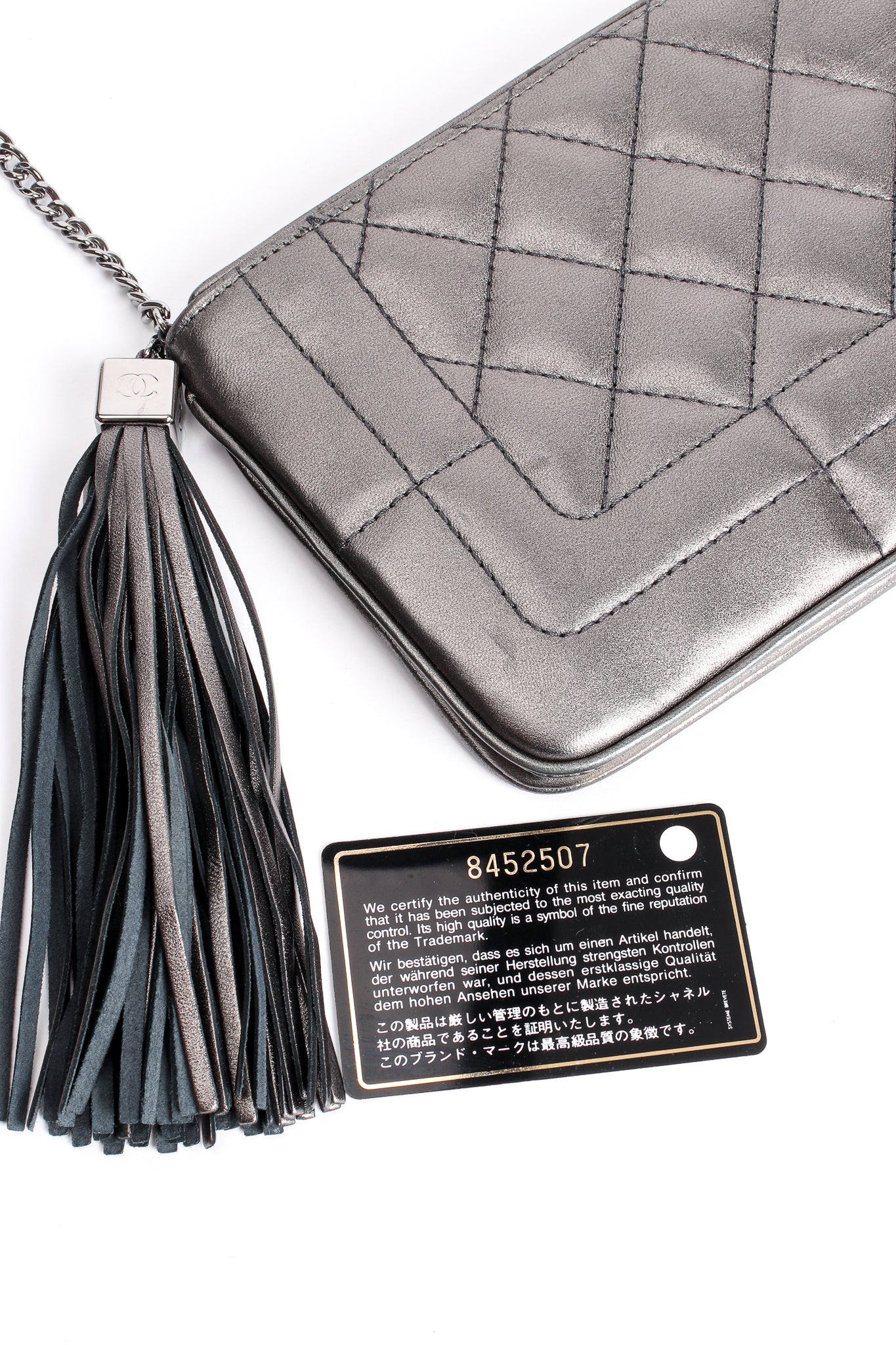 Vintage Chanel 2004 Metallic Quilted Tassel Shoulder Bag authentication card at Recess Los Angeles