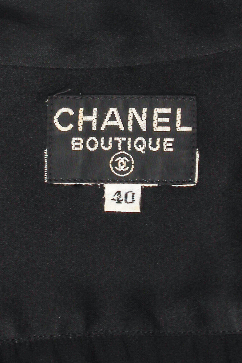Vintage Chanel CC Pocket Black Silk Tie Neck Blouse label at Recess Los Angeles