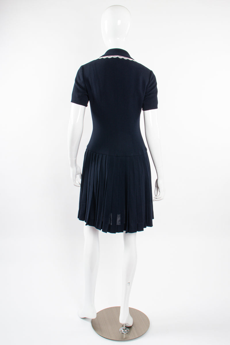 Vintage Chanel 1995C Lace Trim Pleated Uniform Dress on Mannequin back at Recess Los Angeles