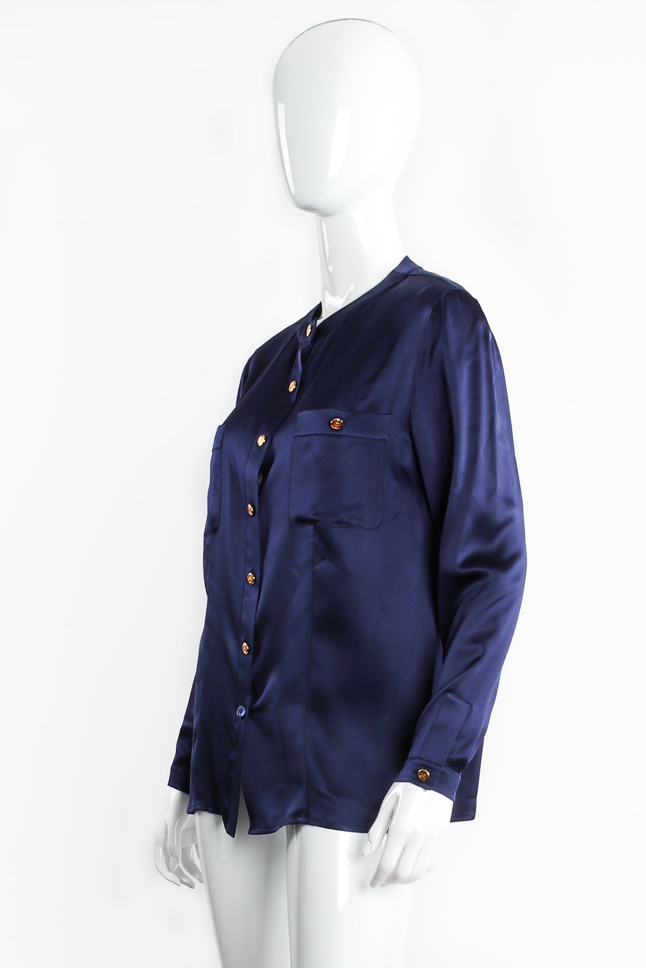 Vintage Chanel Navy Satin Button Pocket Blouse on mannequin angle at Recess Los Angeles