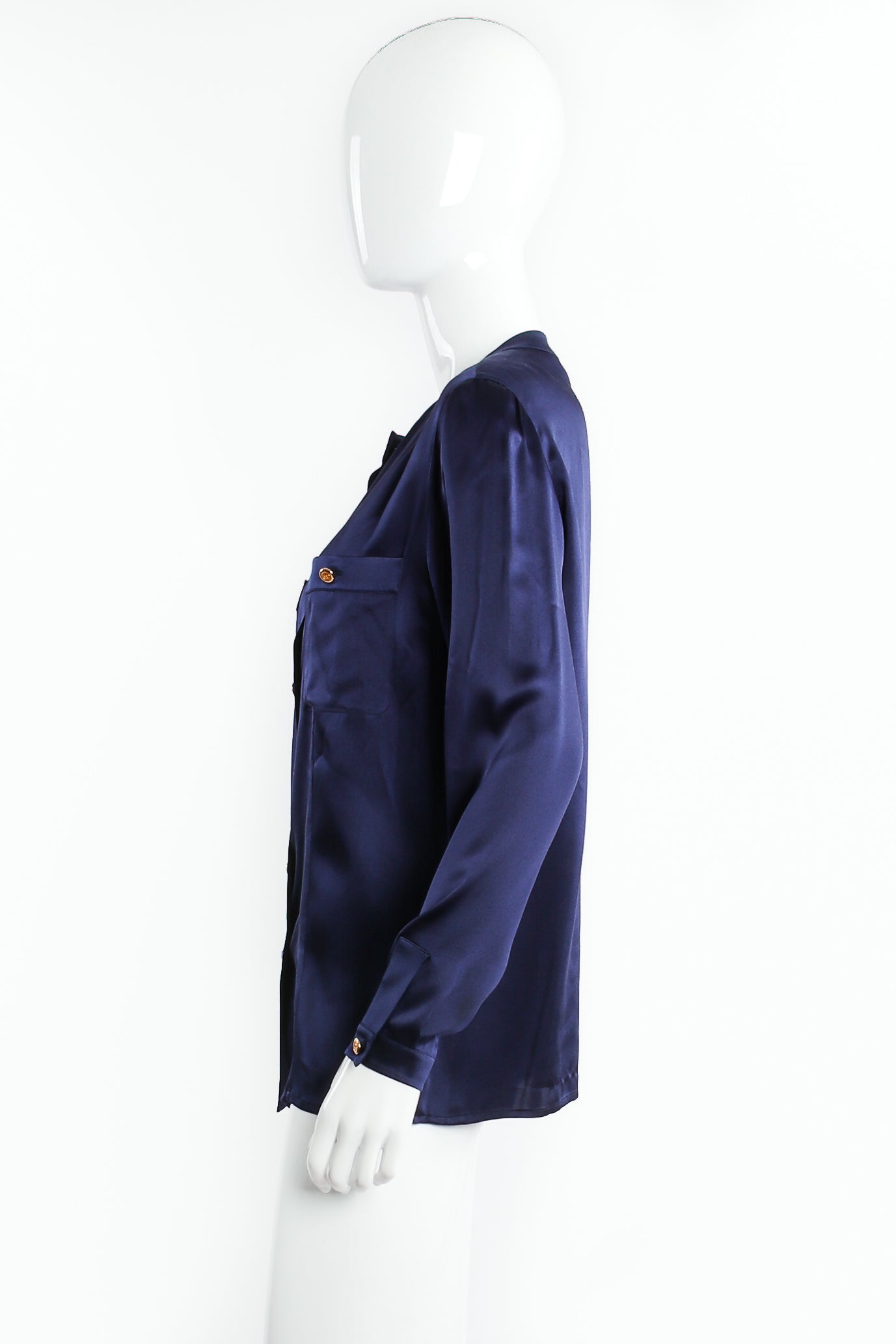 Vintage Chanel Navy Satin Button Pocket Blouse on mannequin side at Recess Los Angeles