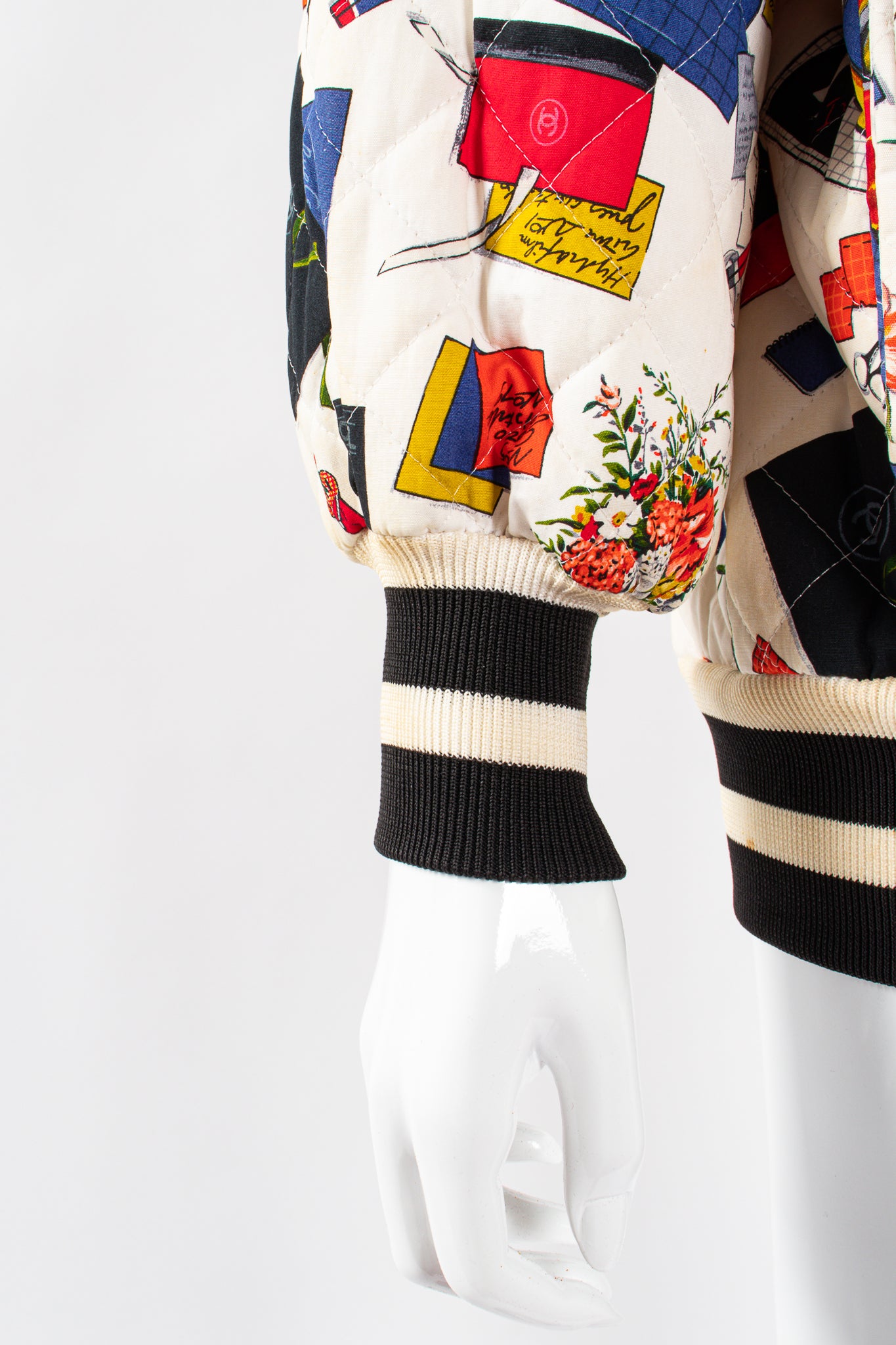 Vintage Chanel 1986 Atelier Illustration Quilted Bomber Jacket on Mannequin cuffs @ Recess LA