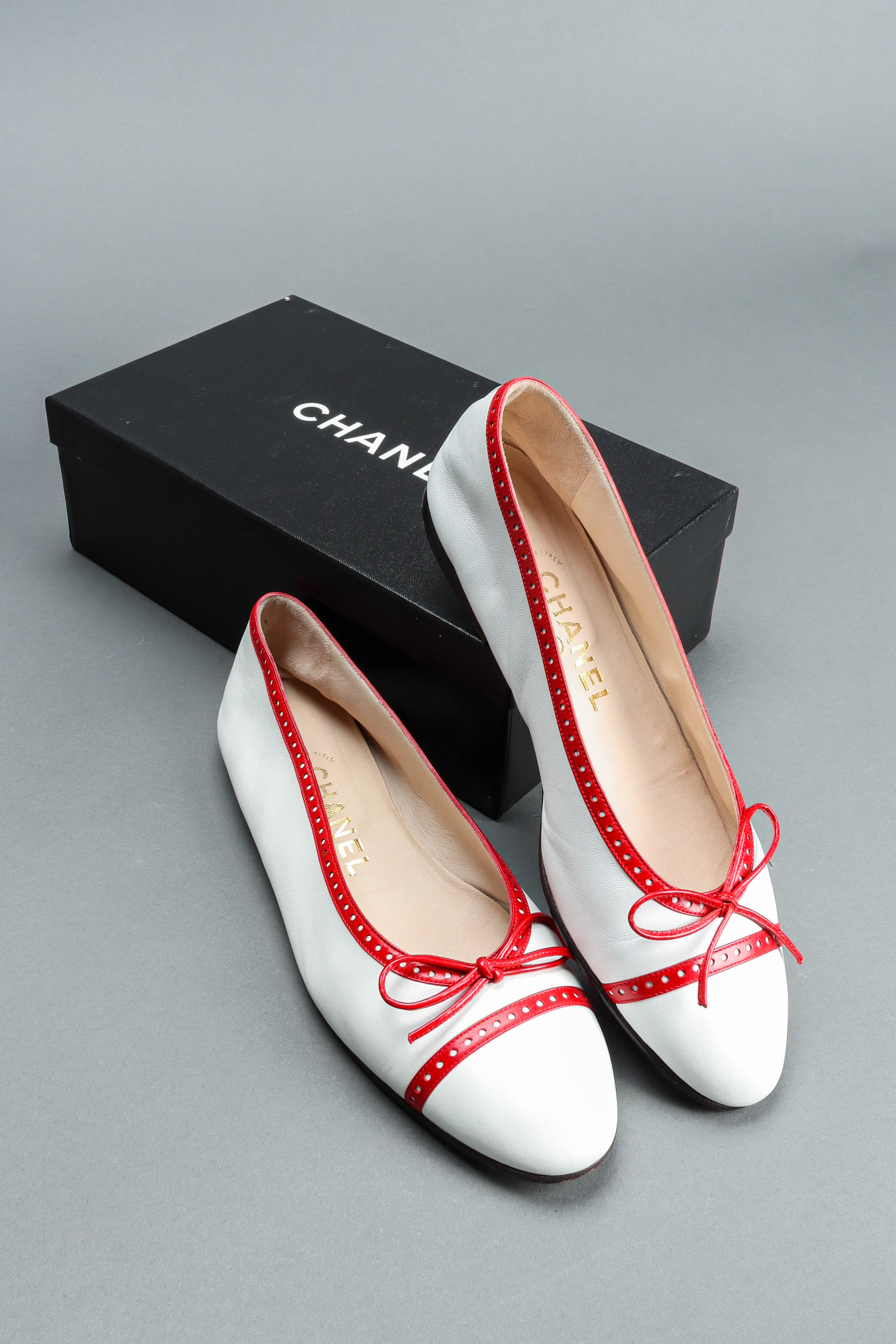 Vintage Chanel Leather Ballet Flats flat lay with box@ Recess LA