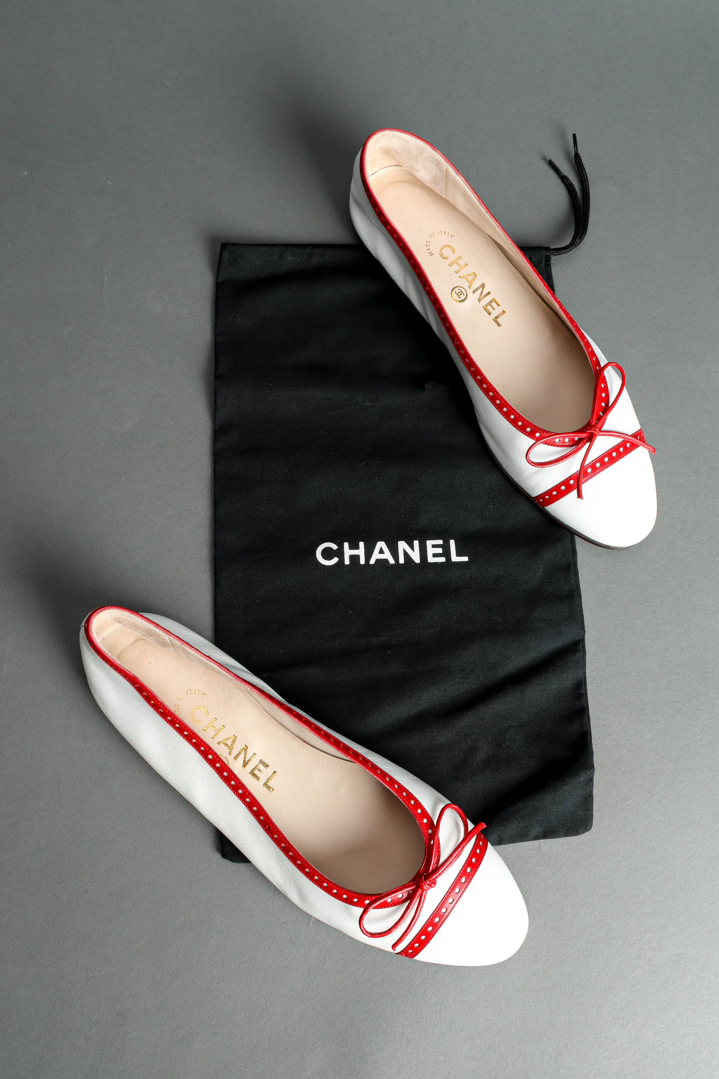Vintage Chanel Leather Ballet Flats aerial flat lay with dust bag  @ Recess LA
