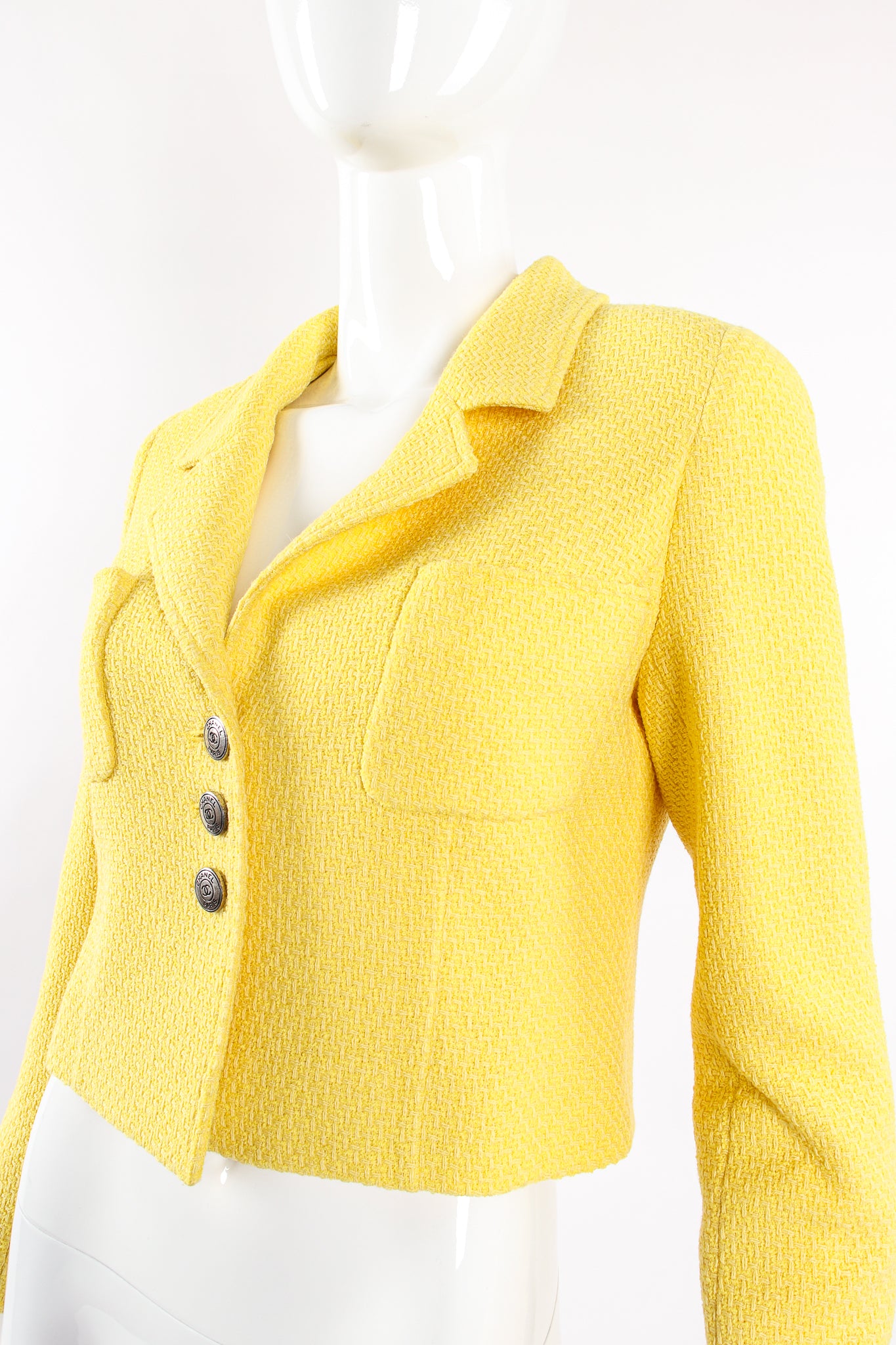 Vintage Chanel Yellow Basketweave Tweed Shrunken Jacket on Mannequin shoulder @ Recess LA