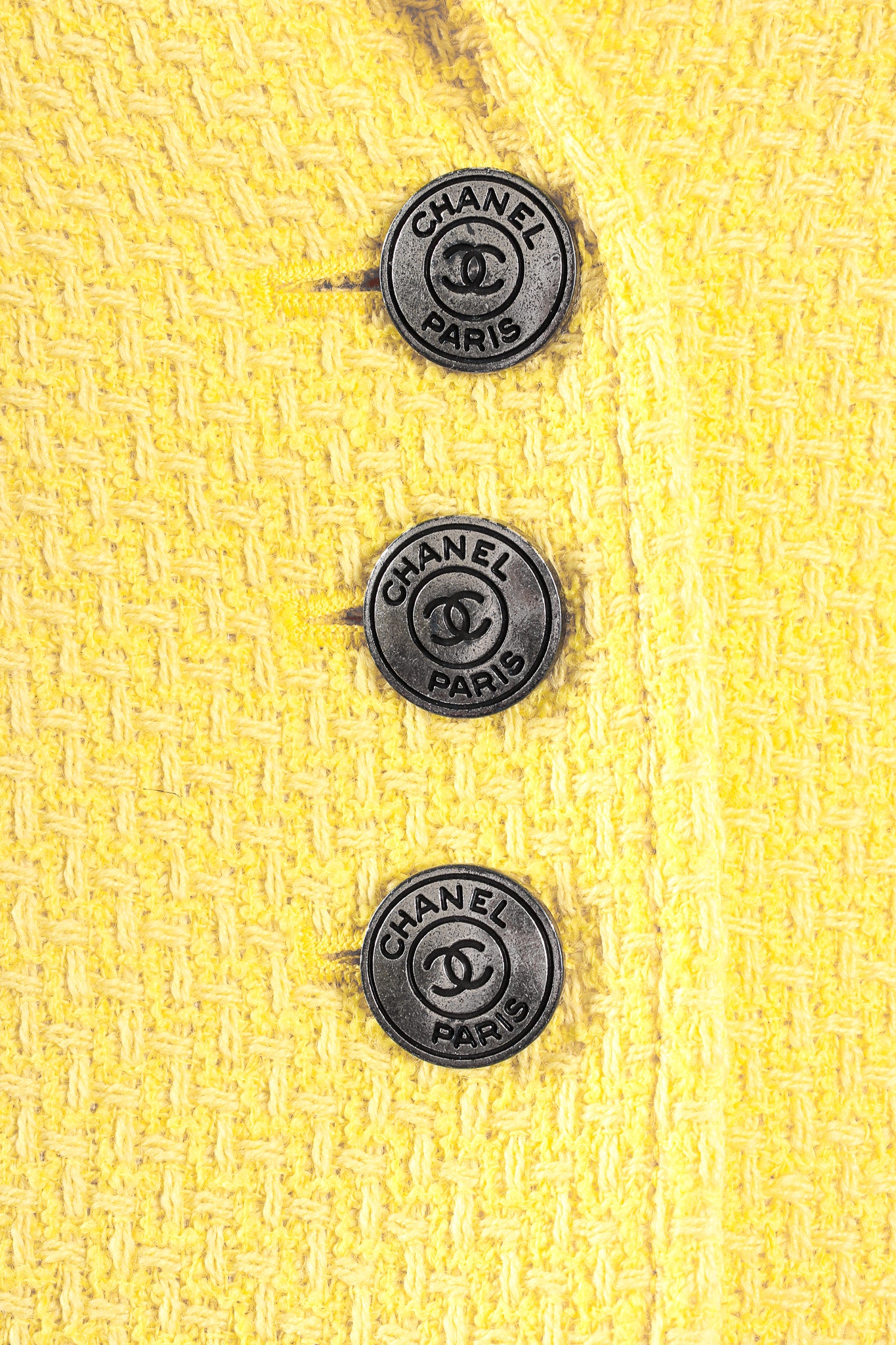 Vintage Chanel Yellow Basketweave Tweed Shrunken Jacket button detail at Recess Los Angeles