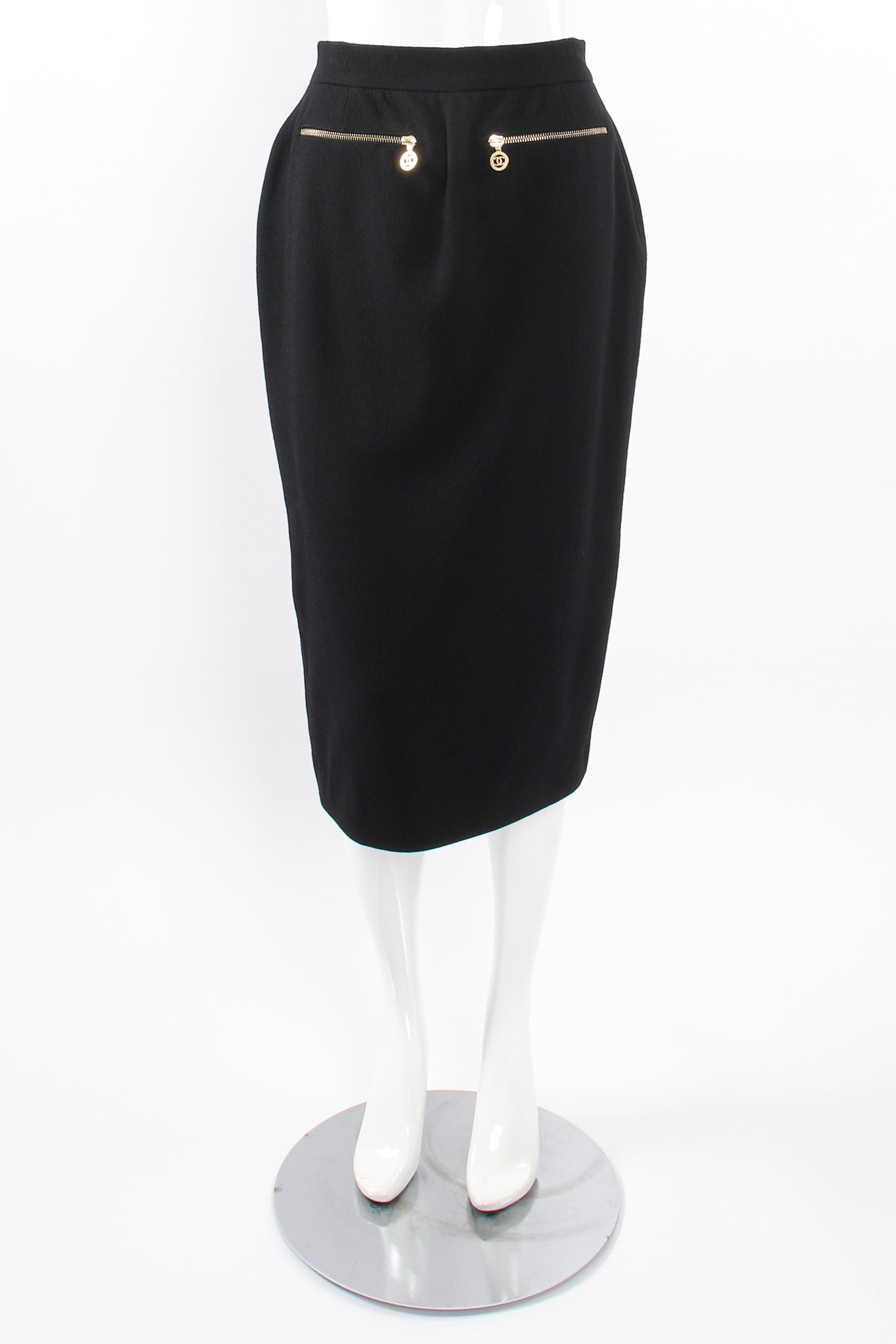 Vintage Chanel CC Logo Zipper Boucle Midi Skirt on Mannequin front at Recess Los Angeles