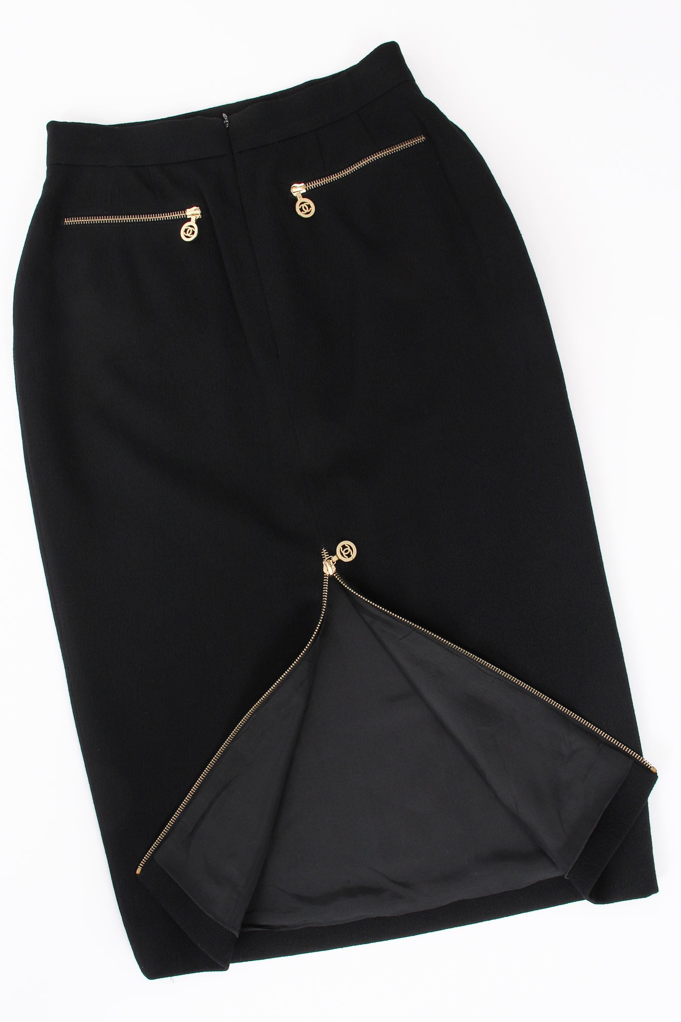 Vintage Chanel CC Logo Zipper Boucle Midi Skirt back flat at Recess Los Angeles