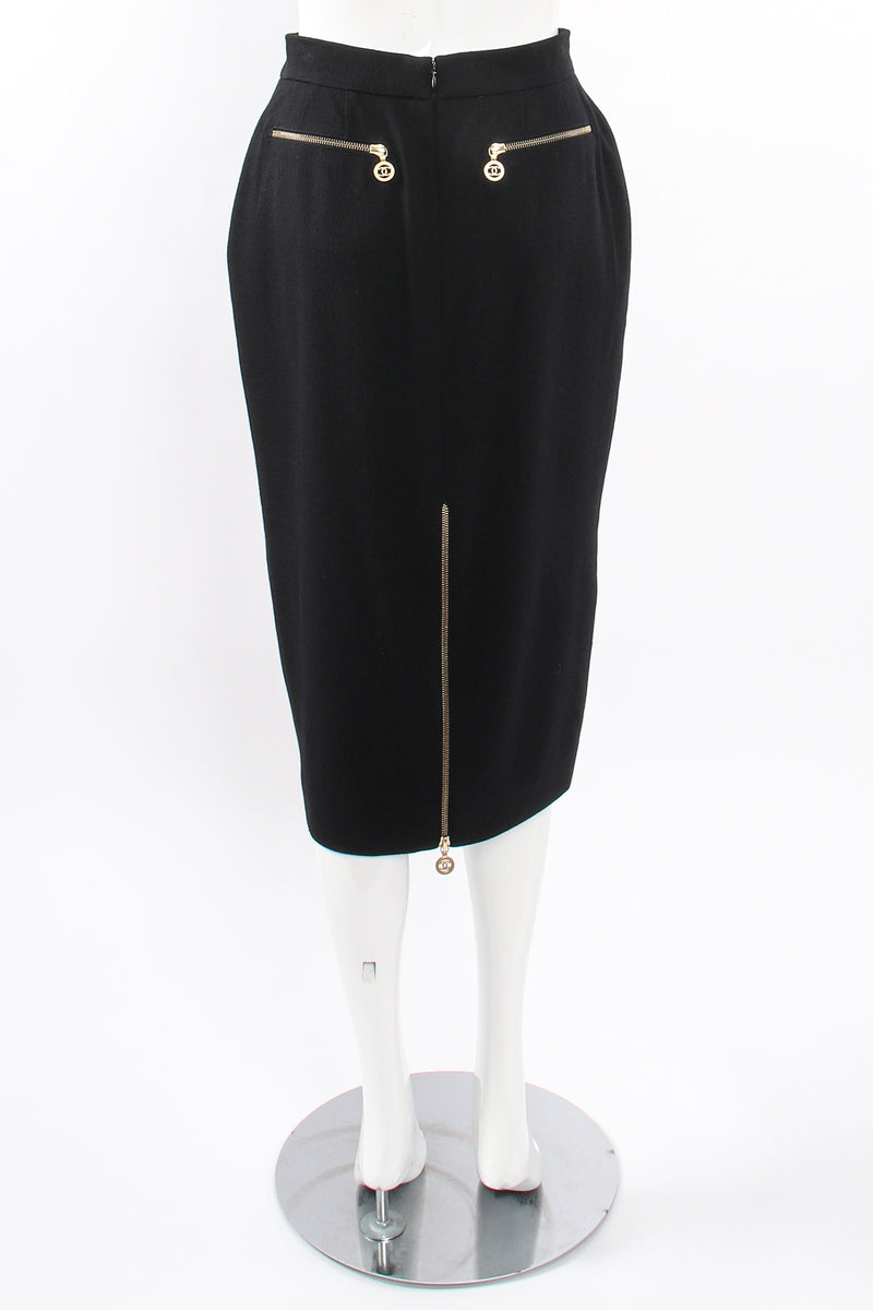 Vintage Chanel CC Logo Zipper Boucle Midi Skirt on Mannequin back at Recess Los Angeles