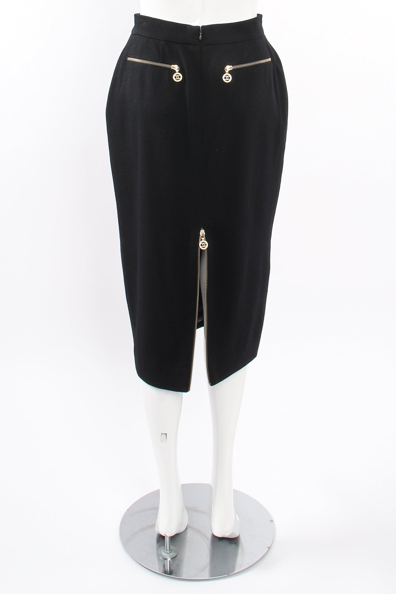 Vintage Chanel CC Logo Zipper Boucle Midi Skirt on Mannequin back unzip at Recess Los Angeles