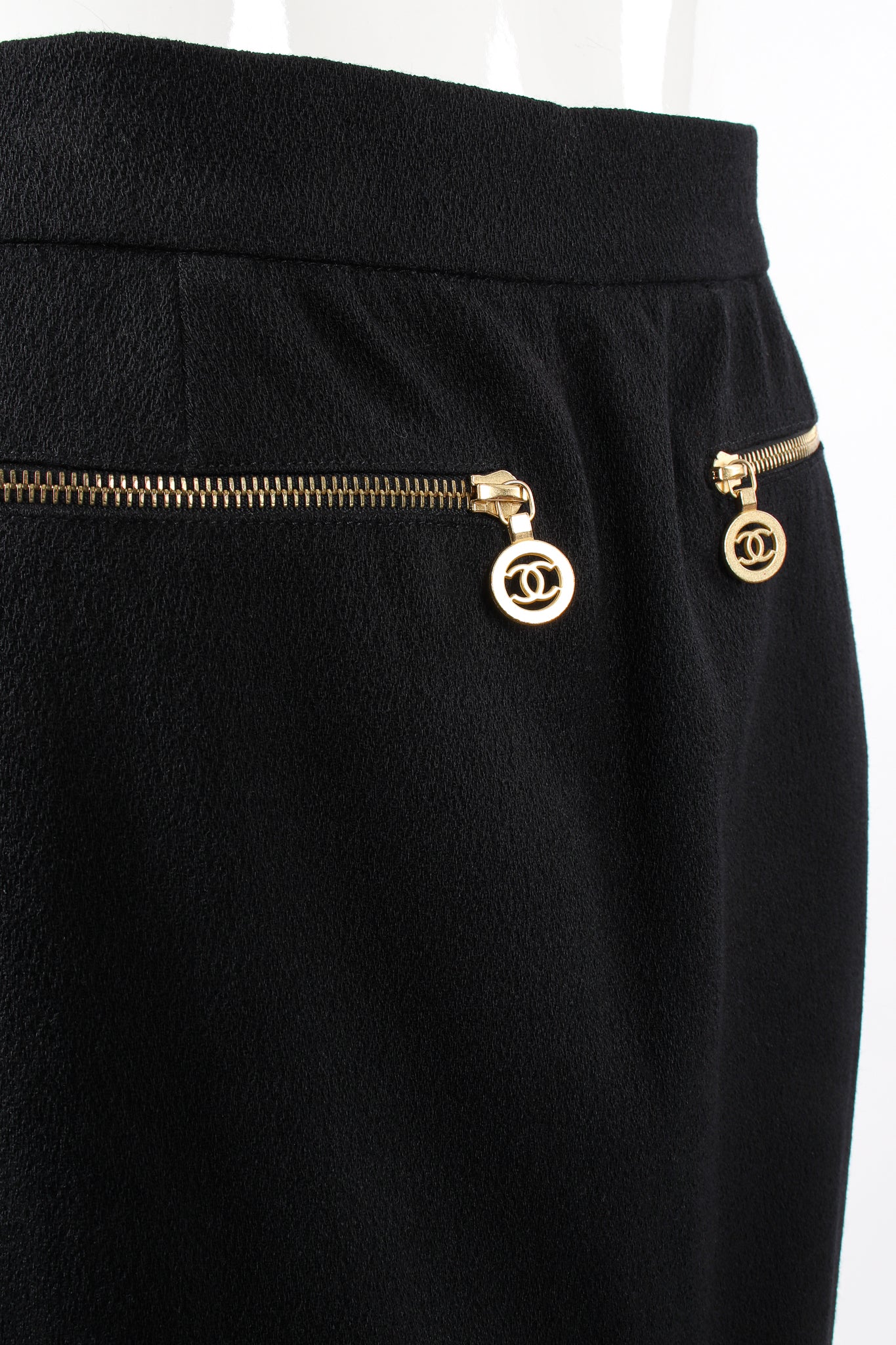 Vintage Chanel CC Logo Zipper Boucle Midi Skirt on Mannequin zip pulls at Recess Los Angeles