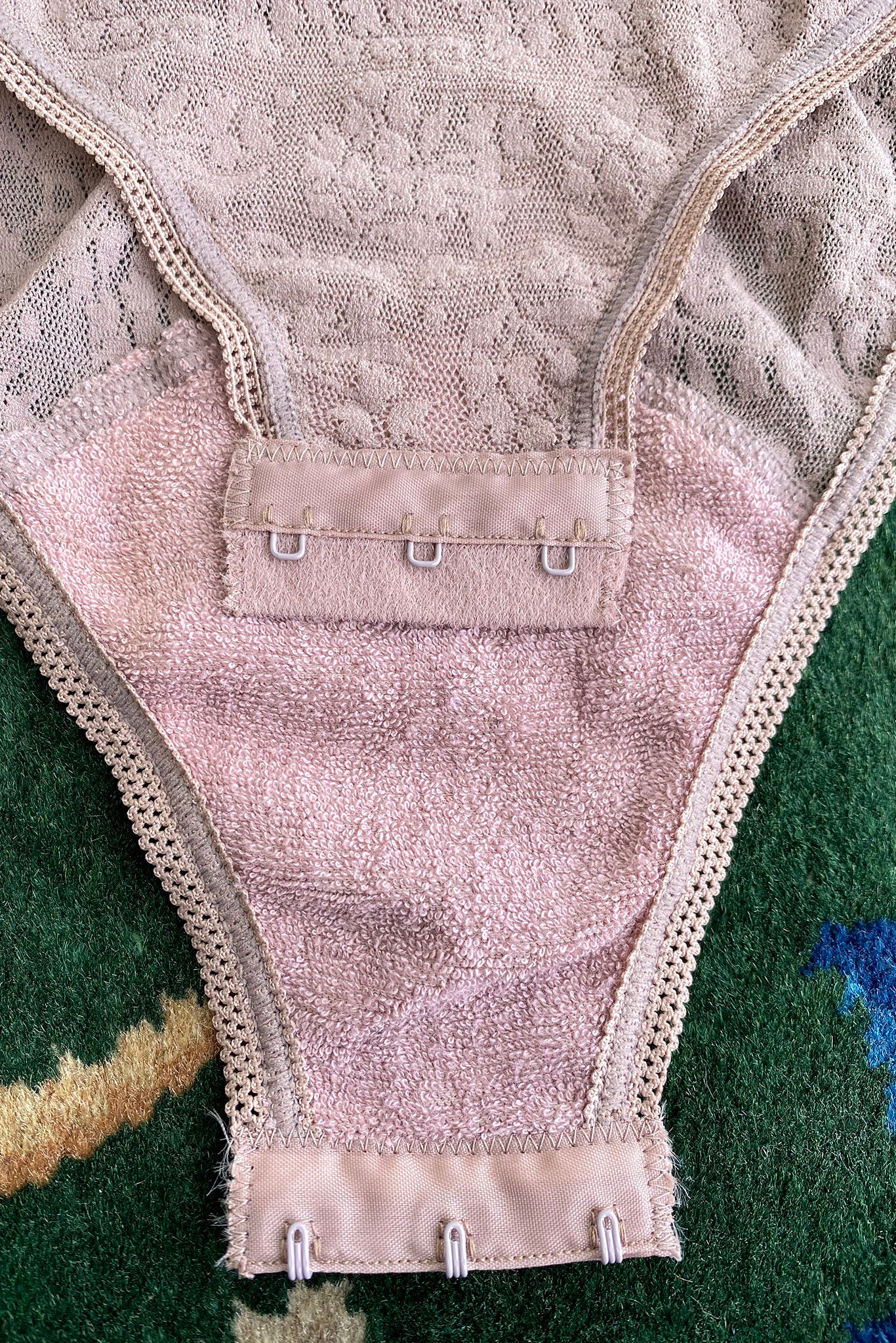 Vintage Christian Dior Deadstock Sheer Lace Logo Bodysuit hook and eye detail at Recess Los Angeles