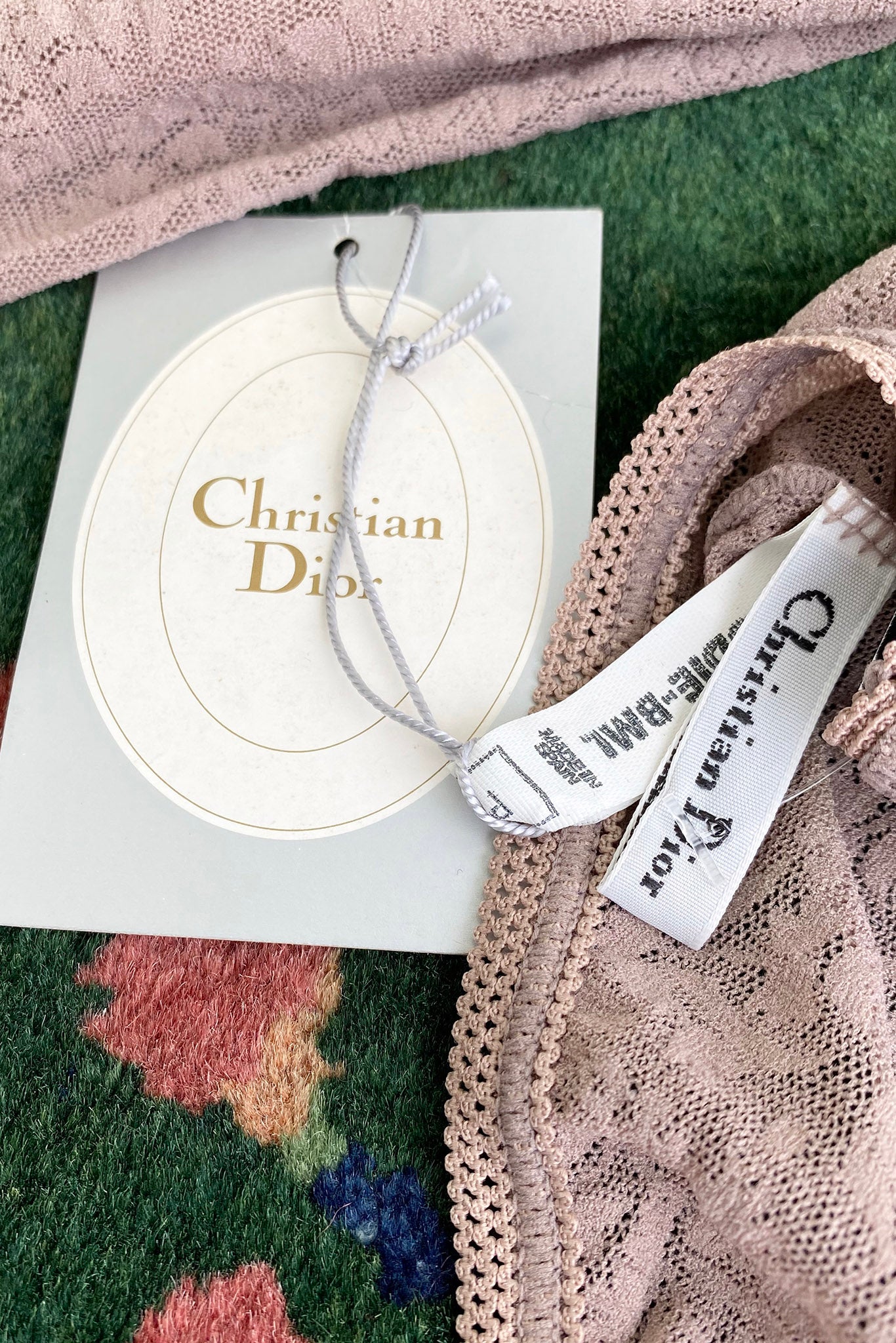 Vintage Christian Dior Deadstock Sheer Lace Logo Bodysuit label and tag at Recess Los Angeles