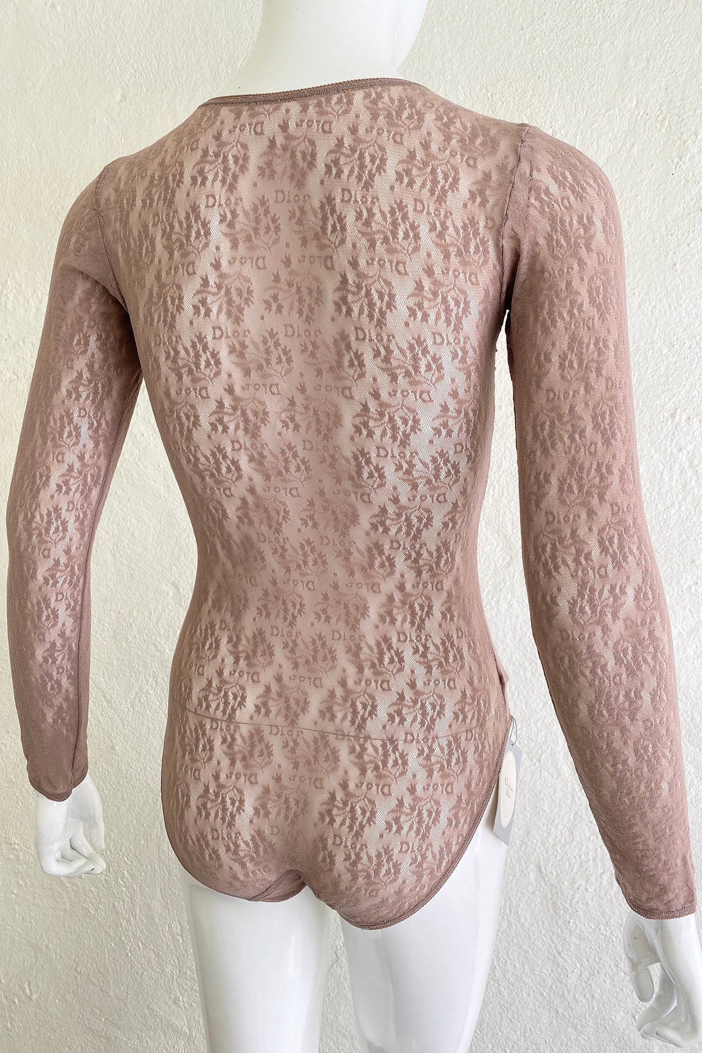 Vintage Christian Dior Deadstock Sheer Lace Logo Bodysuit on Mannequin Back Angle at Recess LA