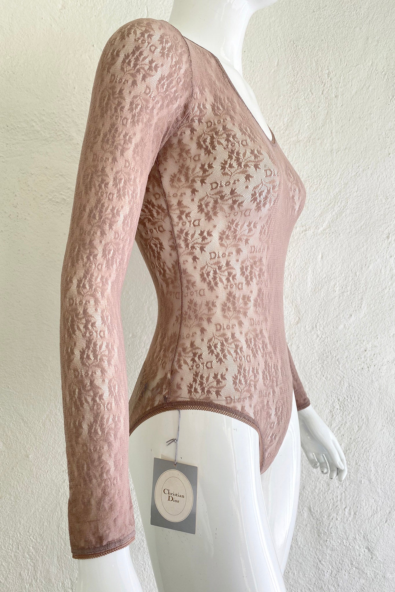 Vintage Christian Dior Deadstock Sheer Lace Logo Bodysuit on Mannequin Side at Recess Los Angeles