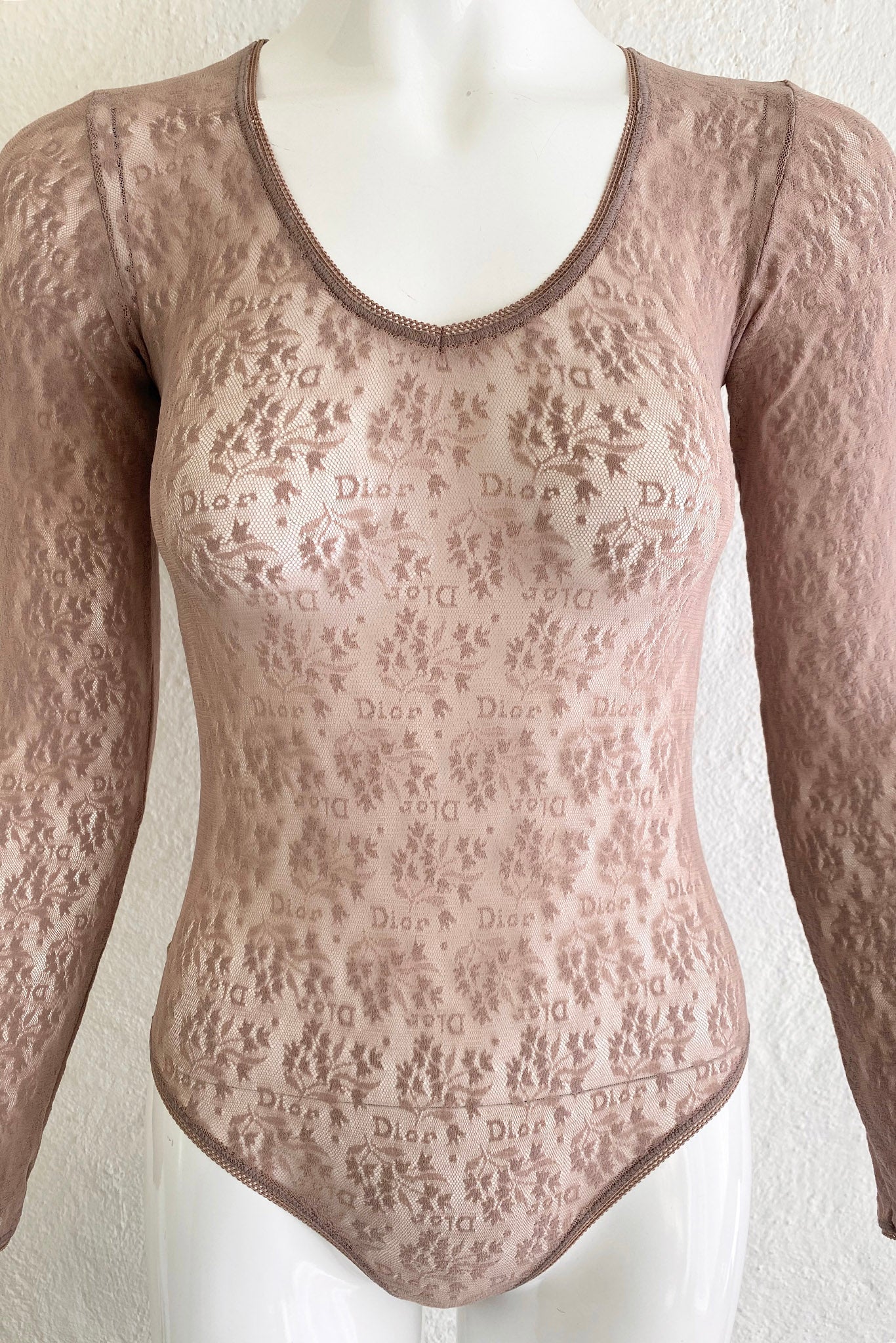 Vintage Christian Dior Deadstock Sheer Lace Logo Bodysuit on Mannequin Crop at Recess Los Angeles